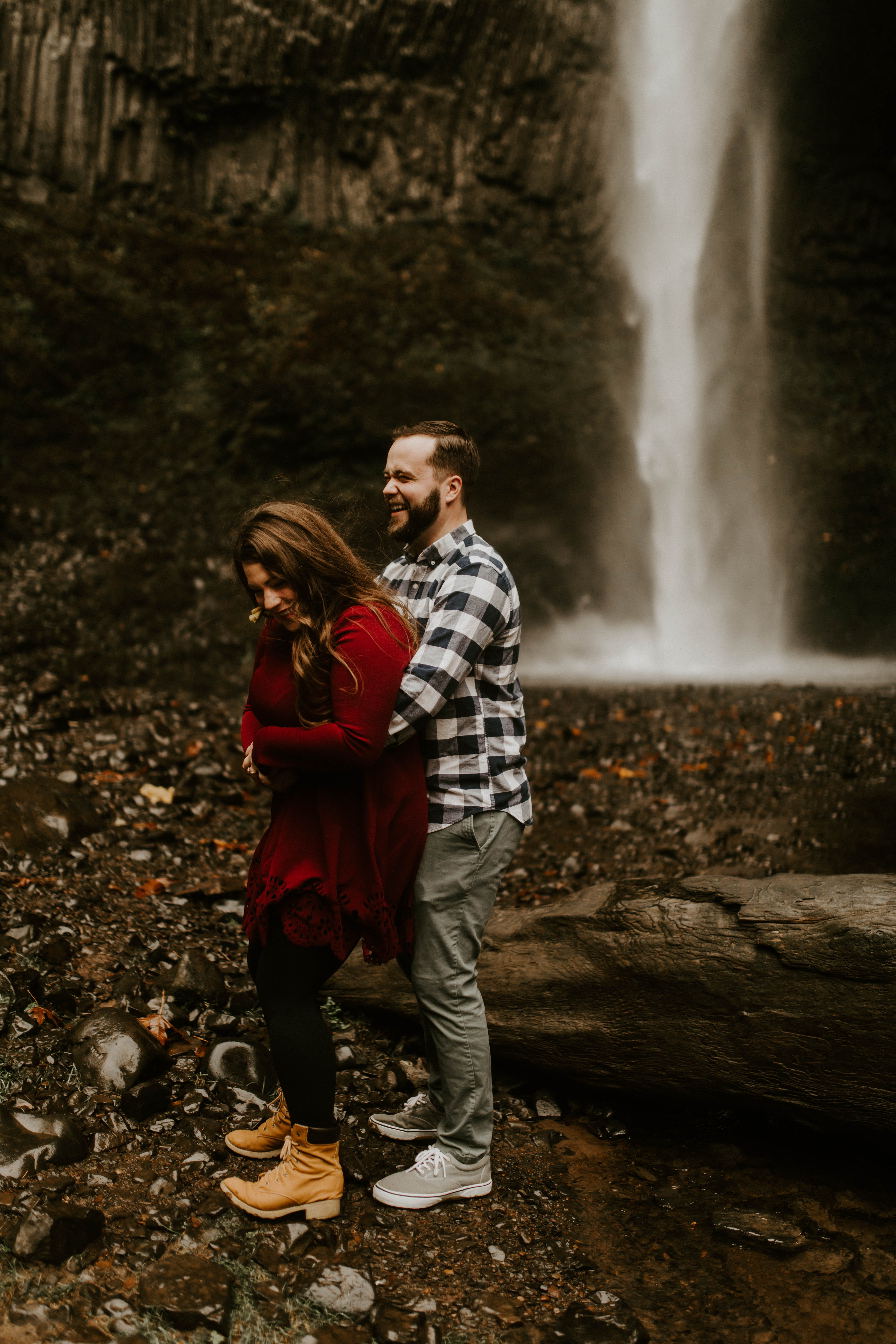 Brandon holds Allison in front of Latourell Falls. Engagement shoot by Sienna Plus Josh.