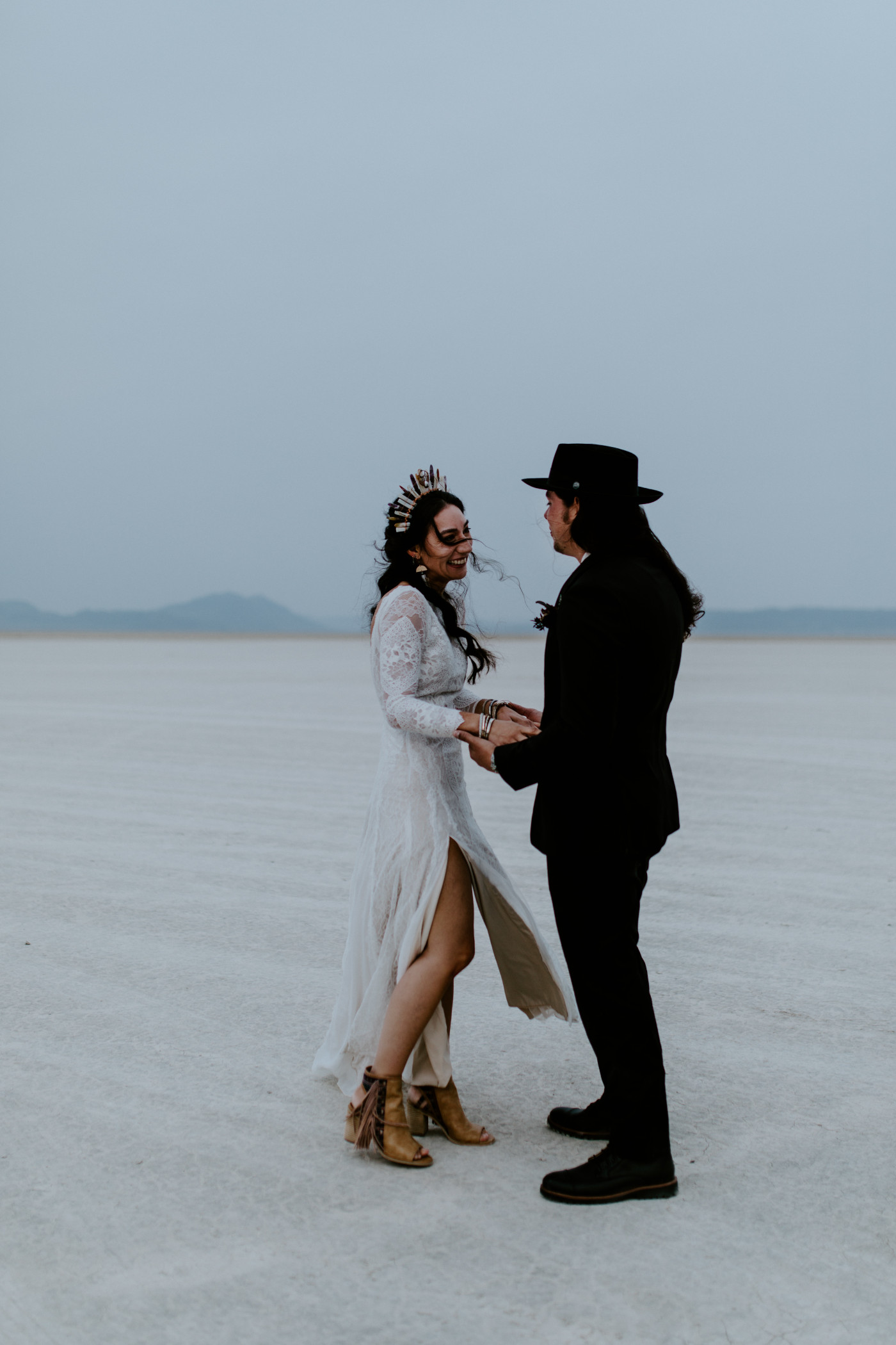 Cameron and Emerald hold hands during their first look.