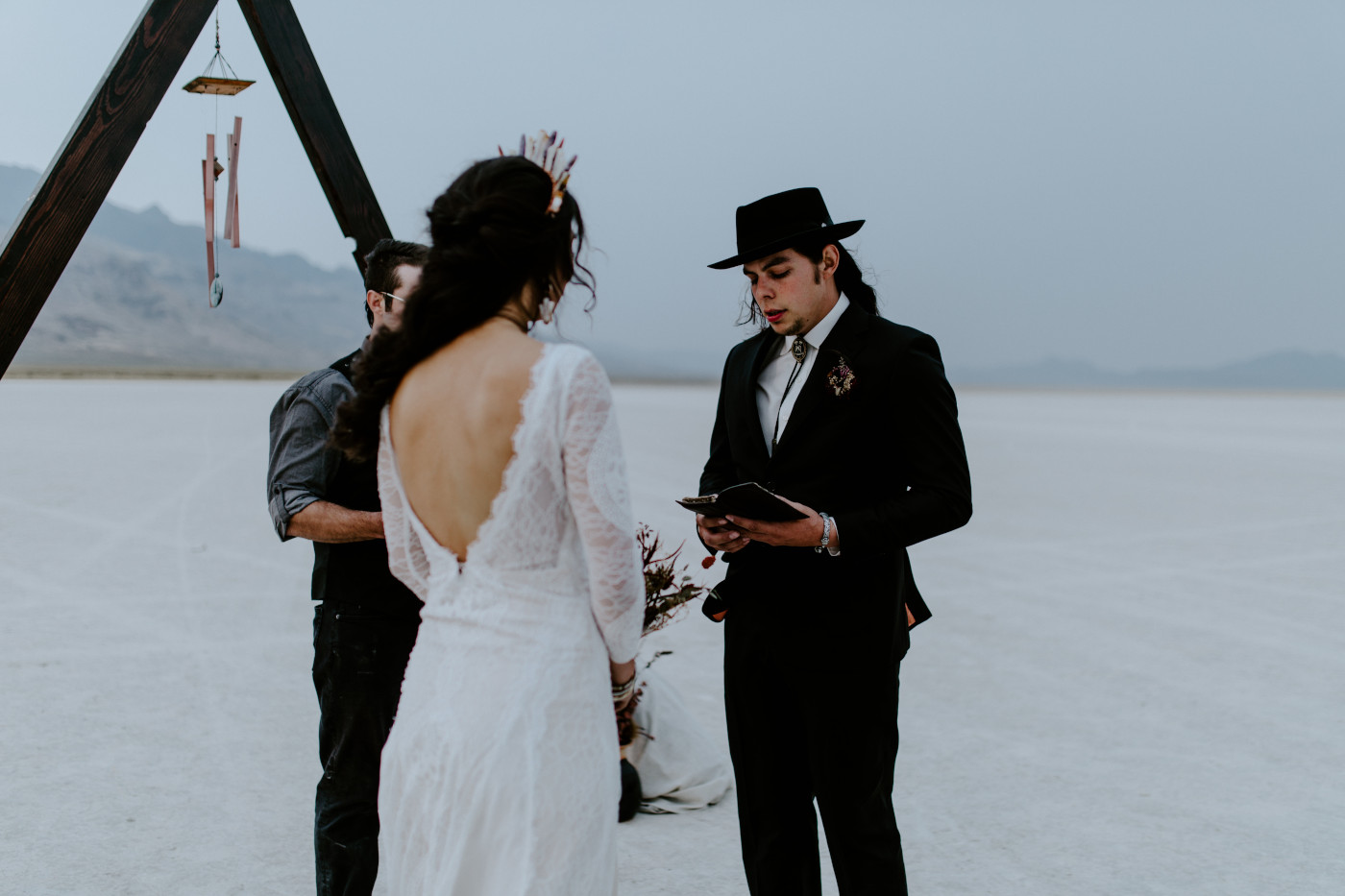 Cameron reads his vows to Emerald.