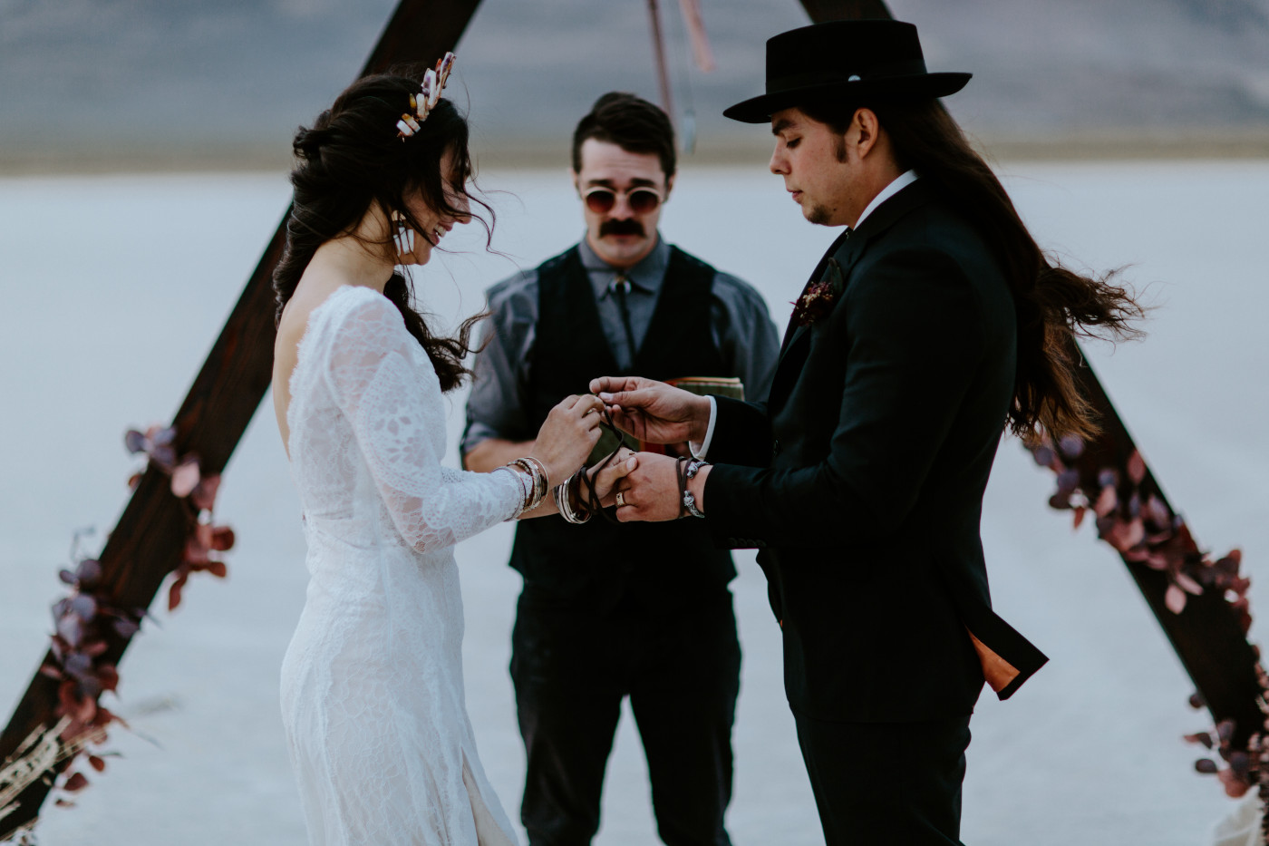 Cameron and Emerald perform a hand fasting ceremony.