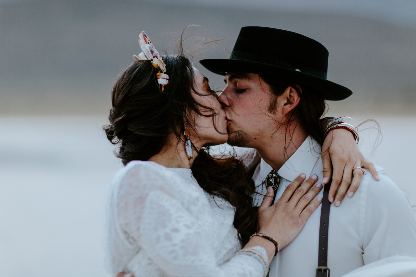 Cameron and Emerald kiss each other.