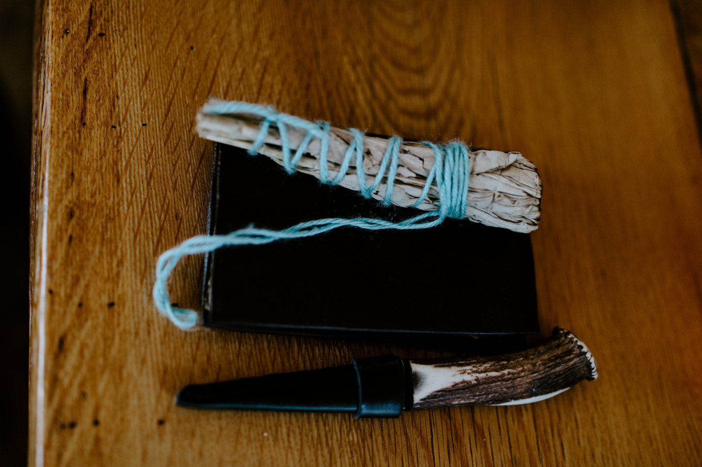 A bundle of sage and ceremonial knife.