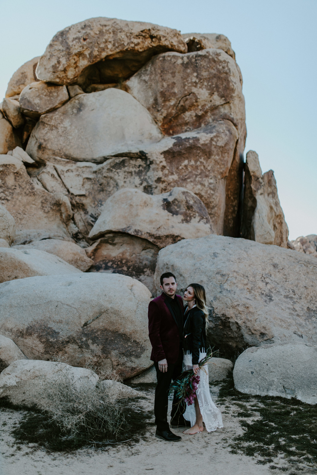 Jeremy and Alyssa stand side by side at Joshua Tree National Park, CA Elopement wedding photography at Joshua Tree National Park by Sienna Plus Josh.