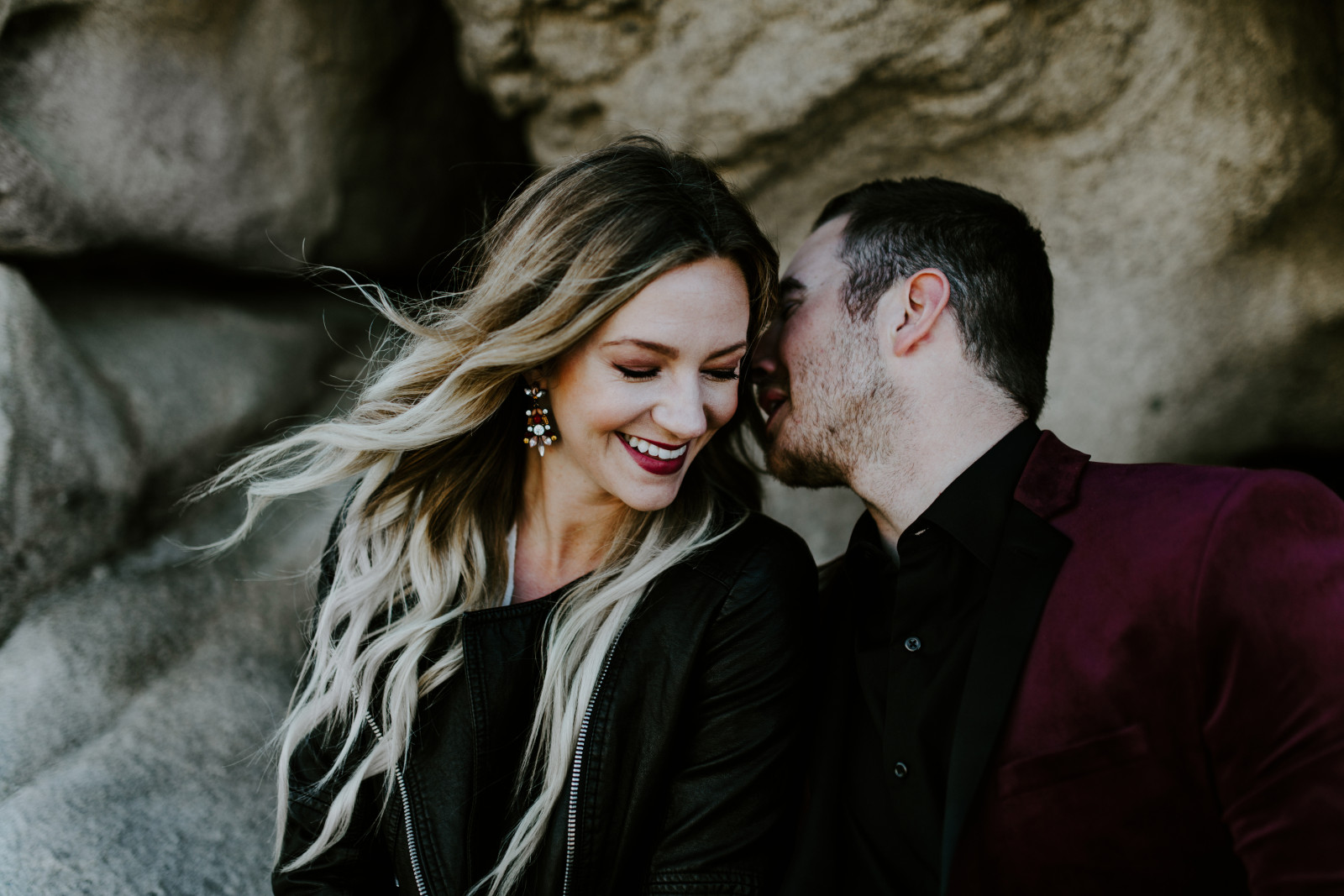 Jeremy whispers to Alyssa. Elopement wedding photography at Joshua Tree National Park by Sienna Plus Josh.