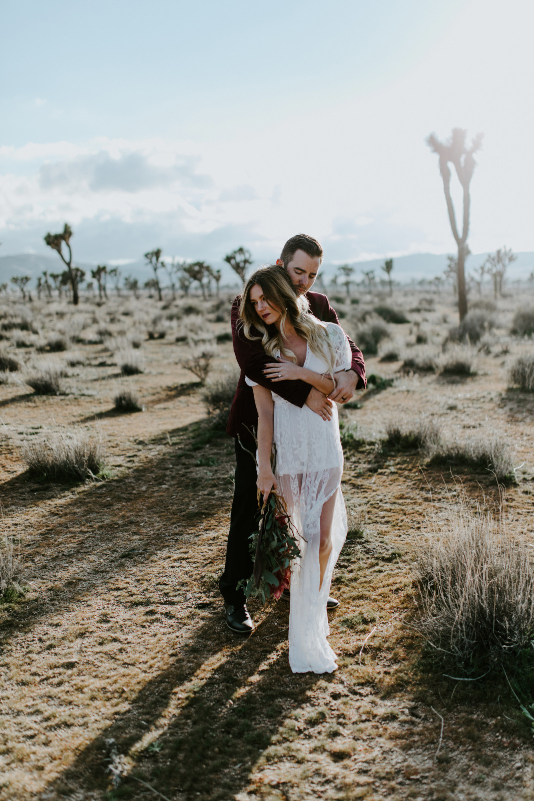 Jeremy kisses Alyssa at Joshua Tree National Park Joshua Tree National Park, CA Elopement wedding photography at Joshua Tree National Park by Sienna Plus Josh.