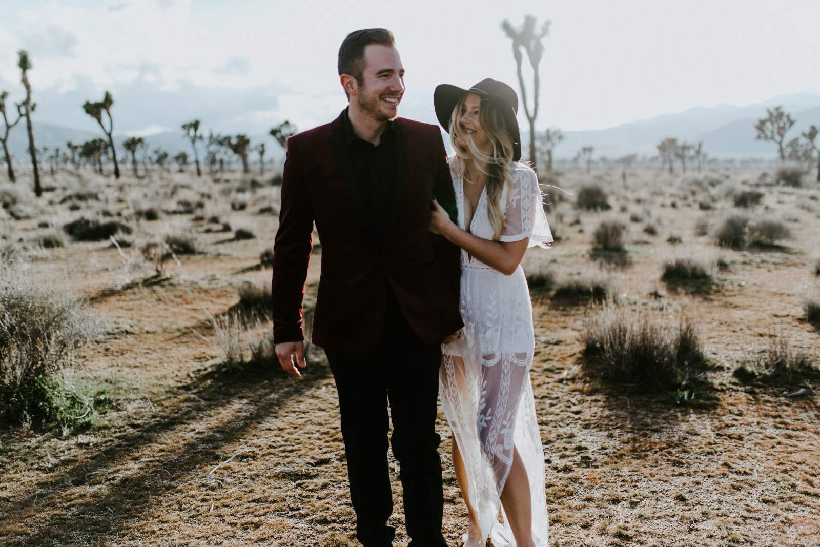 Alyssa and Jeremy share an intimate moment at Joshua Tree National Park, CA Elopement wedding photography at Joshua Tree National Park by Sienna Plus Josh.