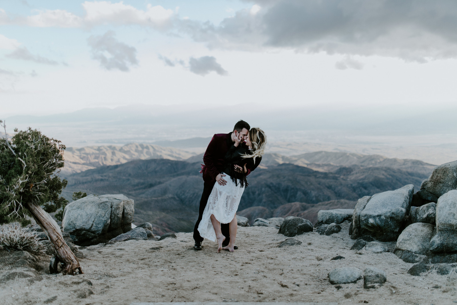 Alyssa and Jeremy hug at Joshua Tree National Park, CA Elopement wedding photography at Joshua Tree National Park by Sienna Plus Josh.