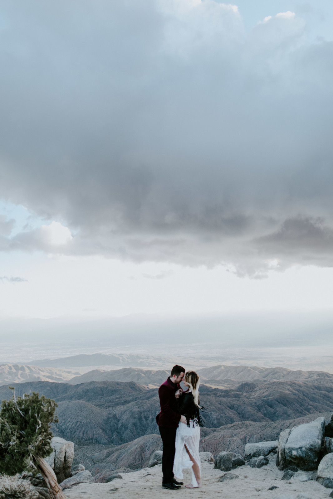 Jeremy kisses Alyssa at Joshua Tree National Park, CA Elopement wedding photography at Joshua Tree National Park by Sienna Plus Josh.