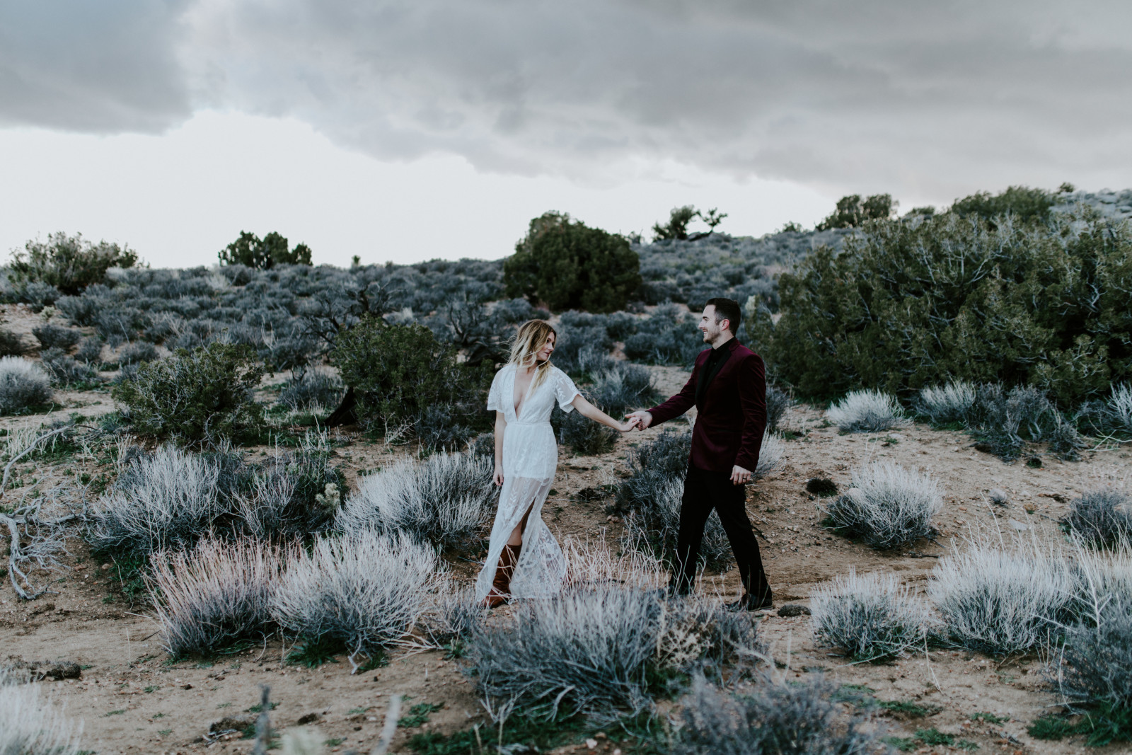 Alyssa and Jeremy share an intimate moment at Joshua Tree National Park, CA Elopement wedding photography at Joshua Tree National Park by Sienna Plus Josh.