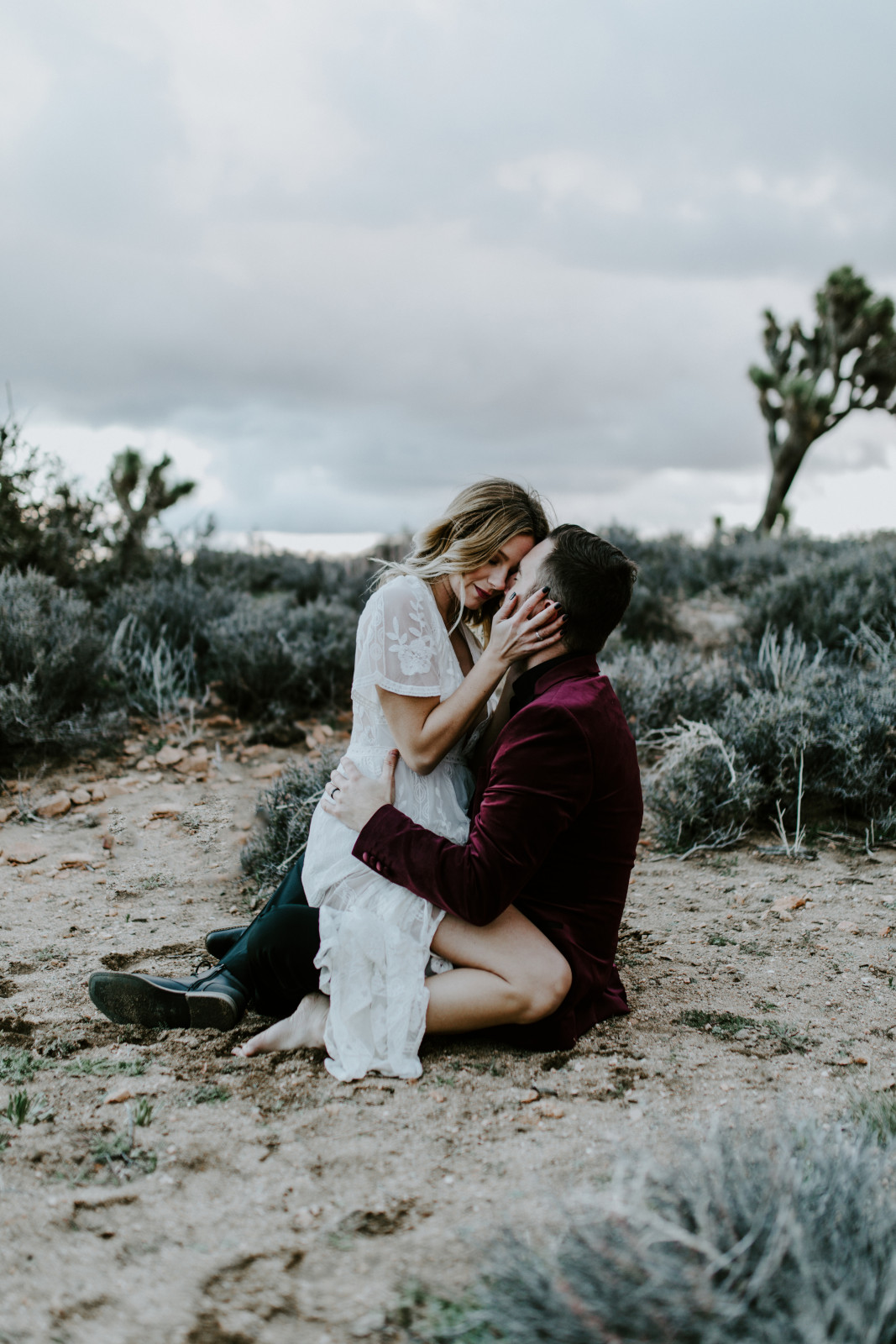 Alyssa and Jeremy kiss. Elopement wedding photography at Joshua Tree National Park by Sienna Plus Josh.