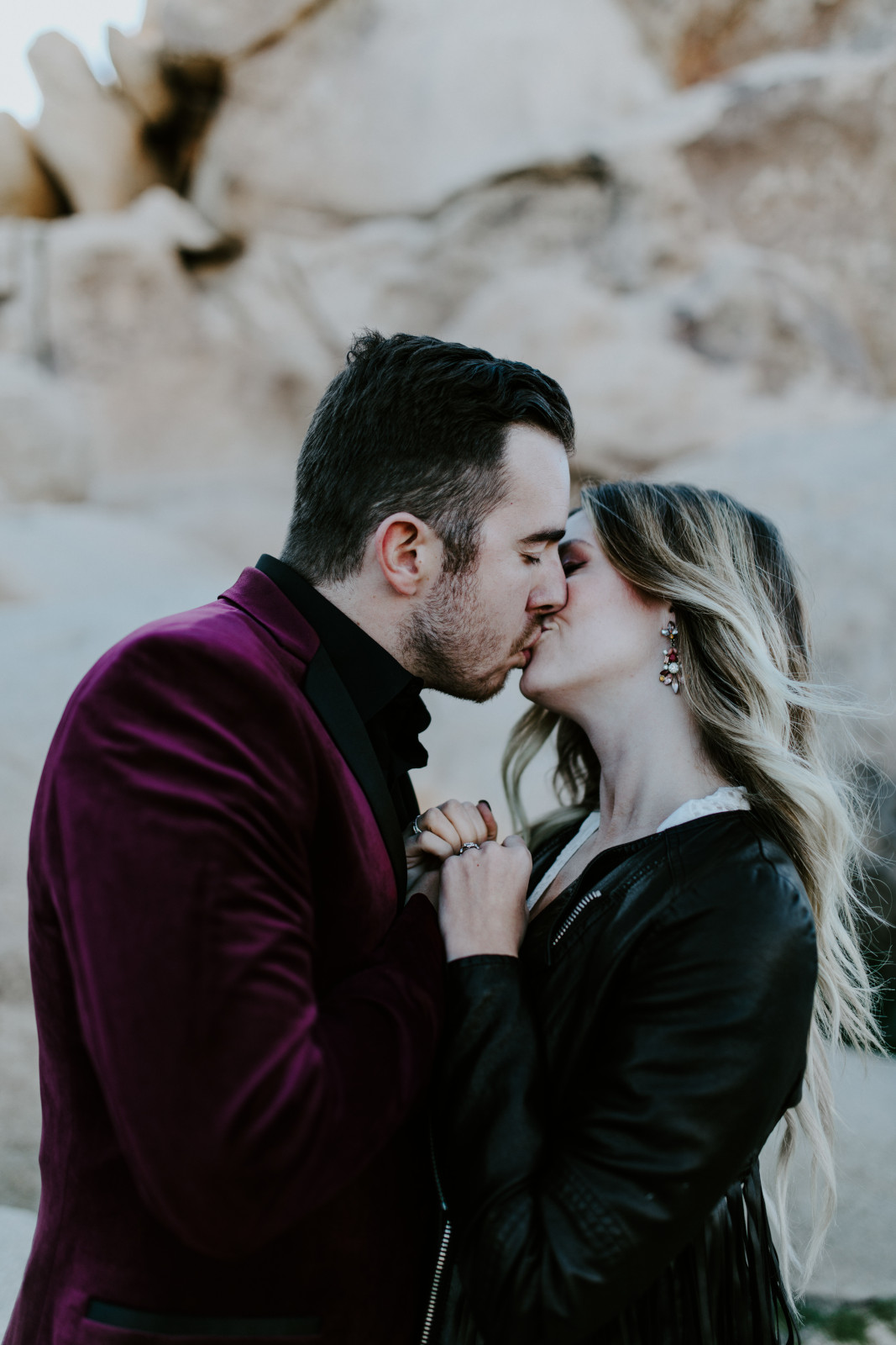 Alyssa and Jeremy go in for a kiss at Joshua Tree National Park, CA Elopement wedding photography at Joshua Tree National Park by Sienna Plus Josh.