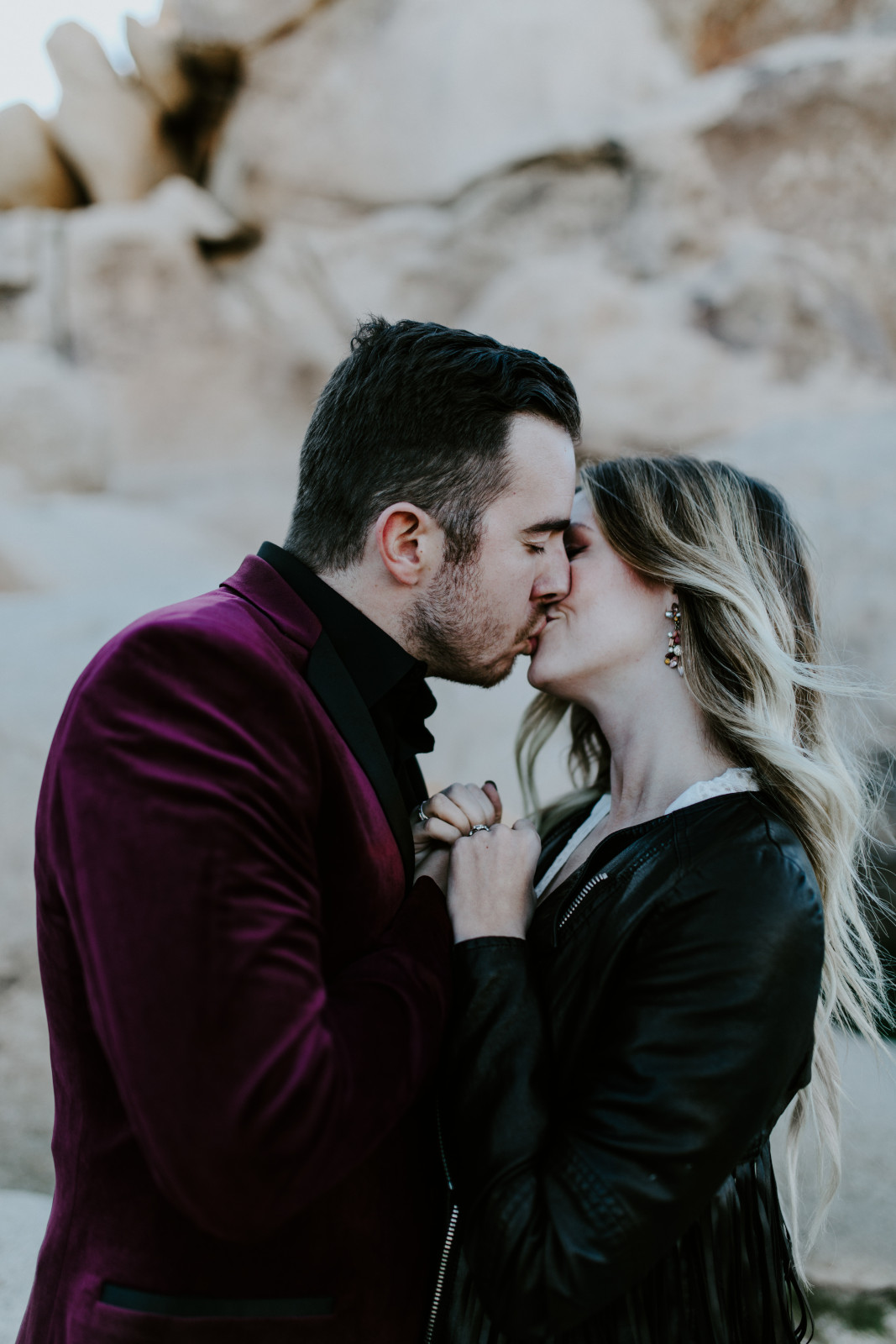 Alyssa and Jeremy go in for a kiss at Joshua Tree National Park, CA Elopement wedding photography at Joshua Tree National Park by Sienna Plus Josh.