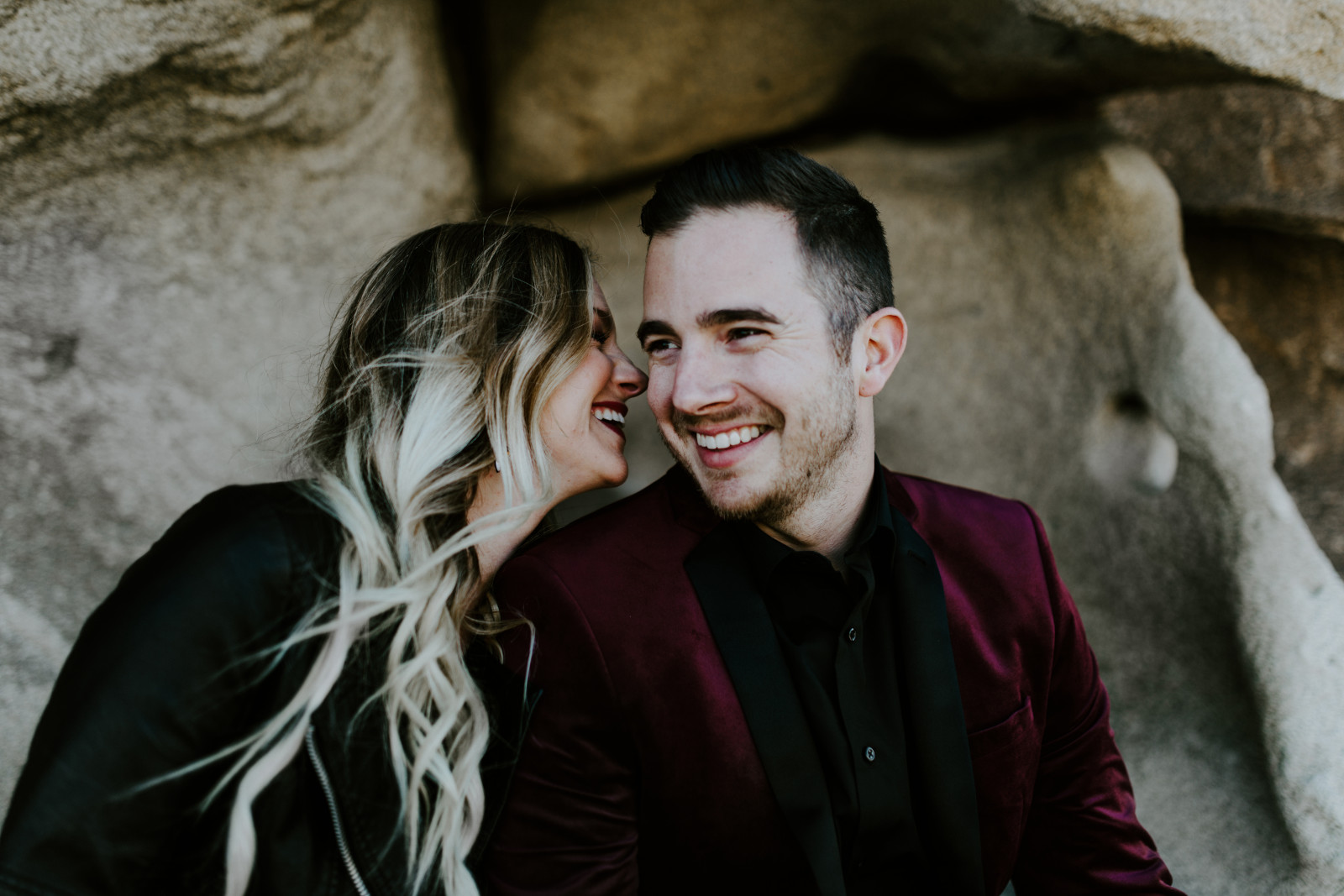 Alyssa goes in to kiss Jeremy. Elopement wedding photography at Joshua Tree National Park by Sienna Plus Josh.