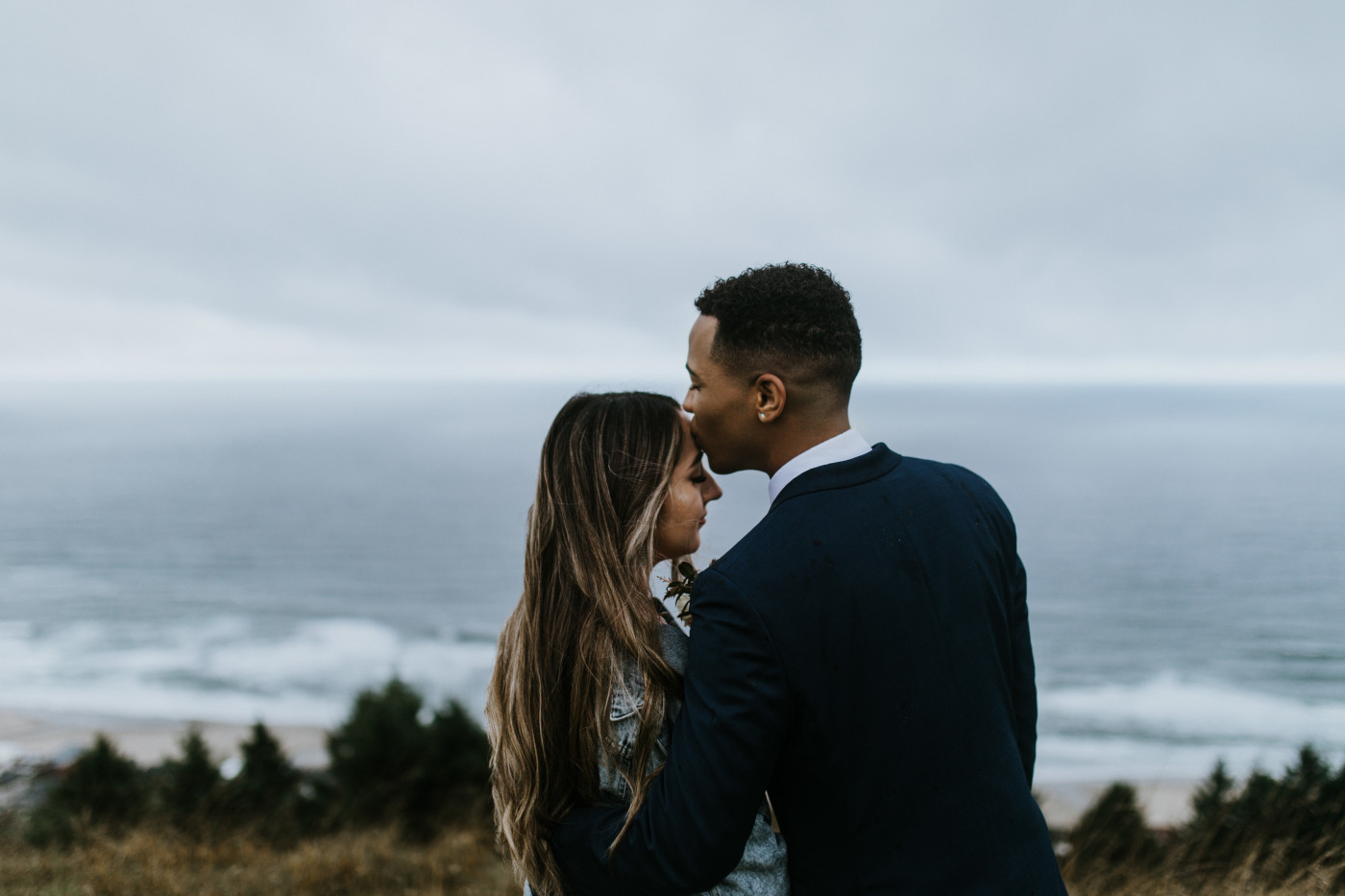 Groom to be kisses bride to be on the forehead. Elopement photography at Mount Hood by Sienna Plus Josh.