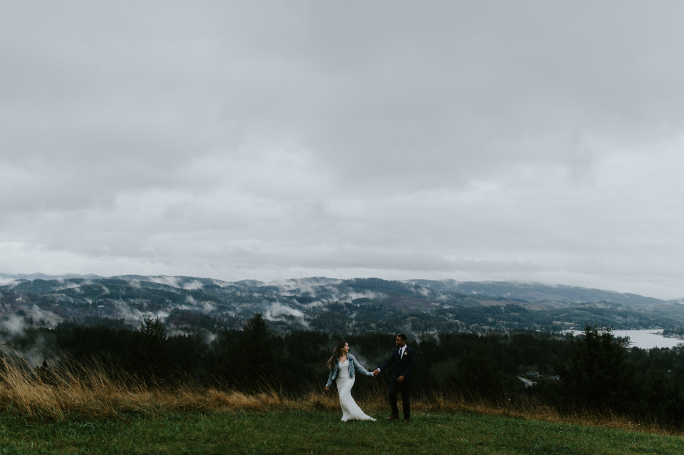 Ariana and Deandre smile at each other. Elopement photography at Mount Hood by Sienna Plus Josh.