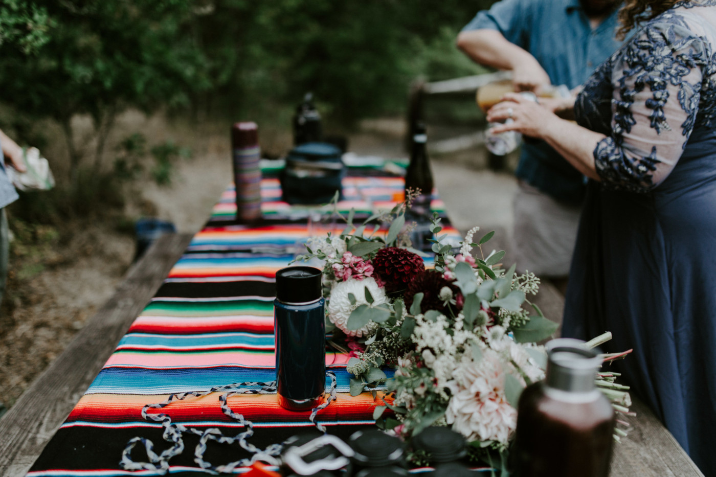 Kate and Audrey's picnic bench setup. Elopement wedding photography at Bridal Veil Falls by Sienna Plus Josh.