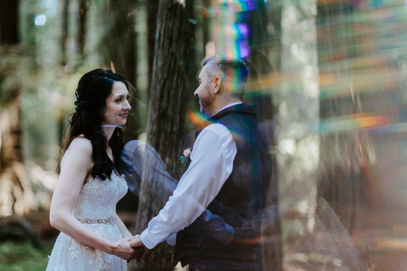 Tim and Hannah hold hands.