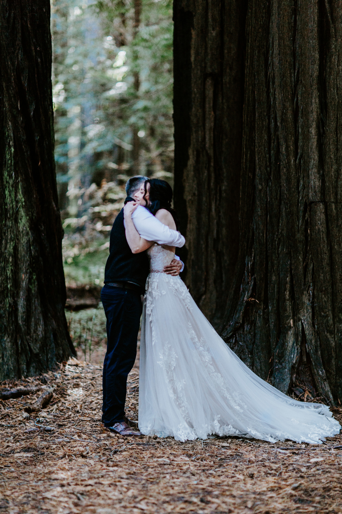 Hannah and Tim hug.