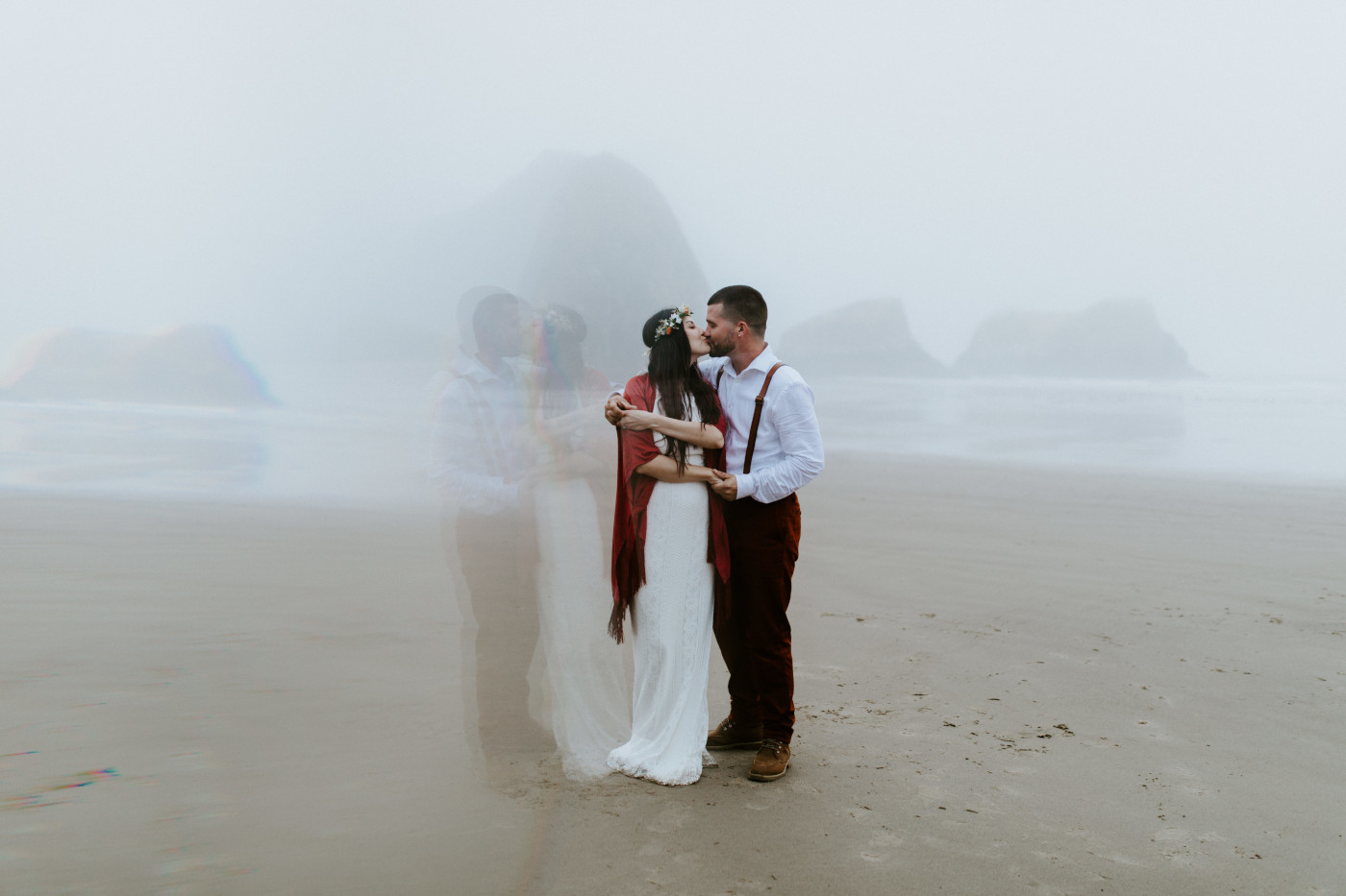 Allison and TJ kiss on the beach.