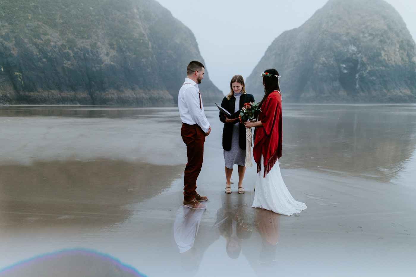 Allison and TJ stand during their elopement ceremony.