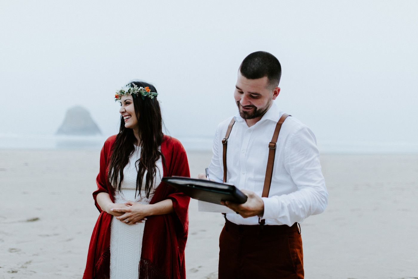 Allison and TJ sign their elopement certificate.