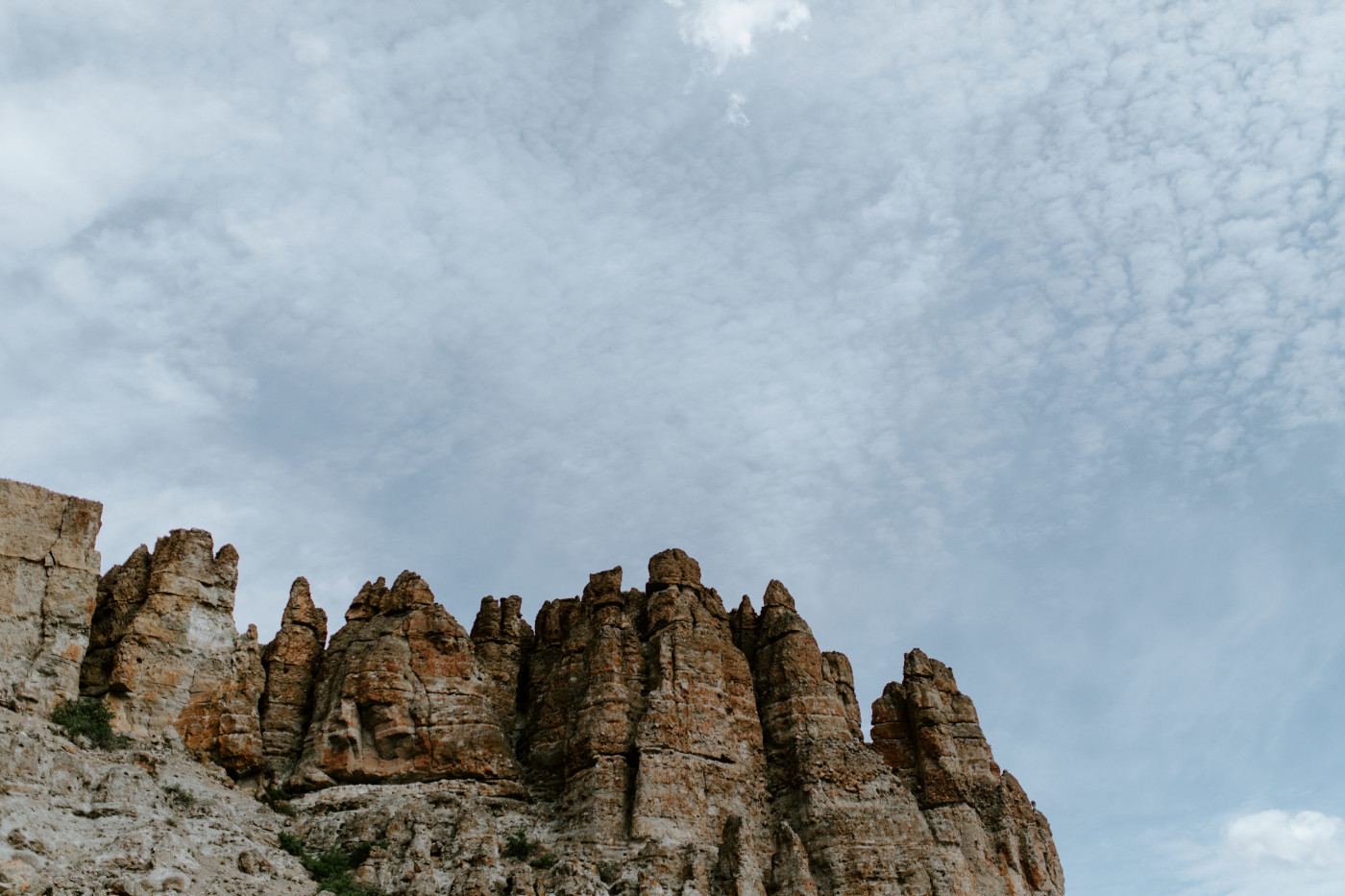 The rock formations of the area. Elopement photography in the Central Oregon desert by Sienna Plus Josh.