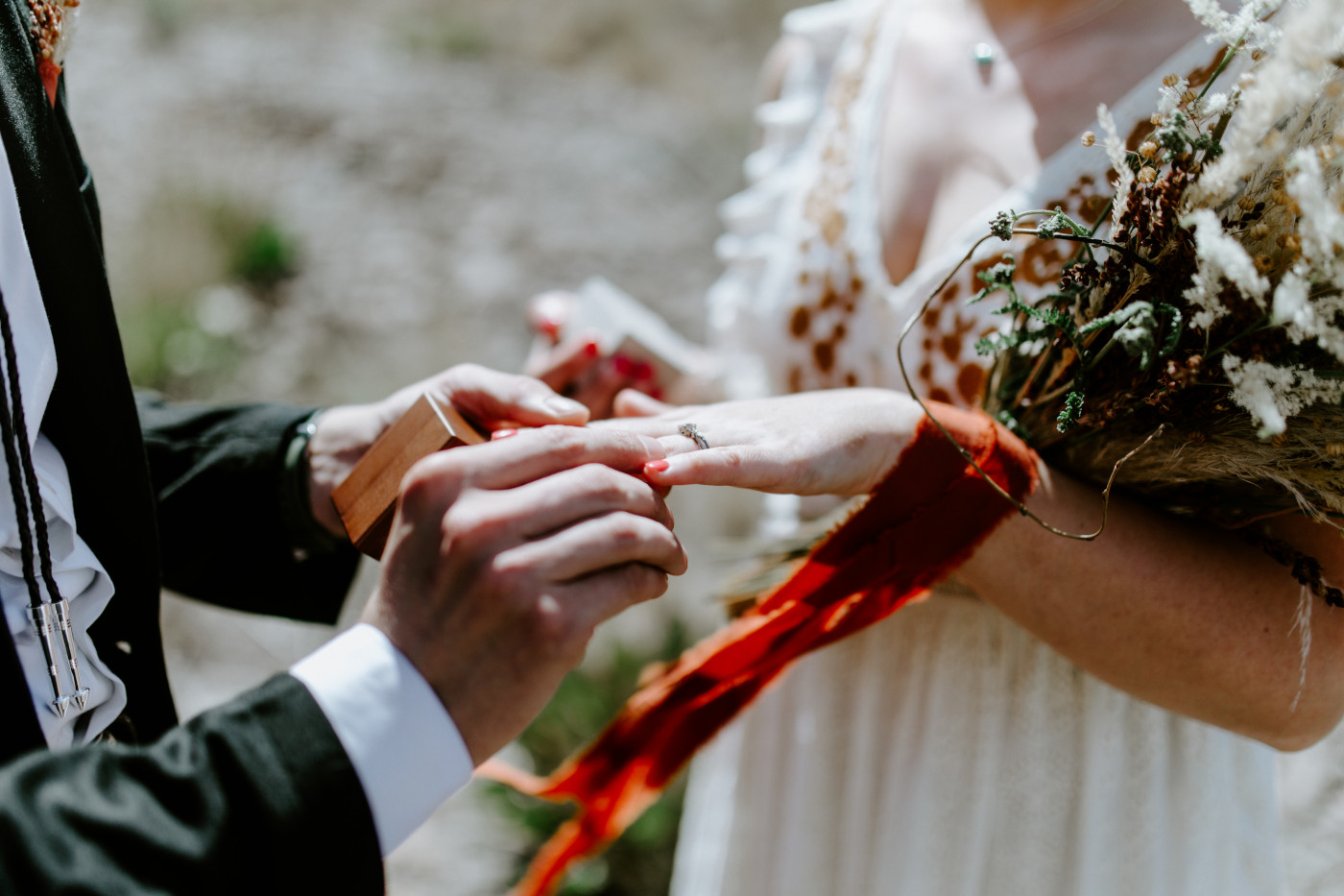 Greyson puts a ring on Emily. Elopement photography in the Central Oregon desert by Sienna Plus Josh.