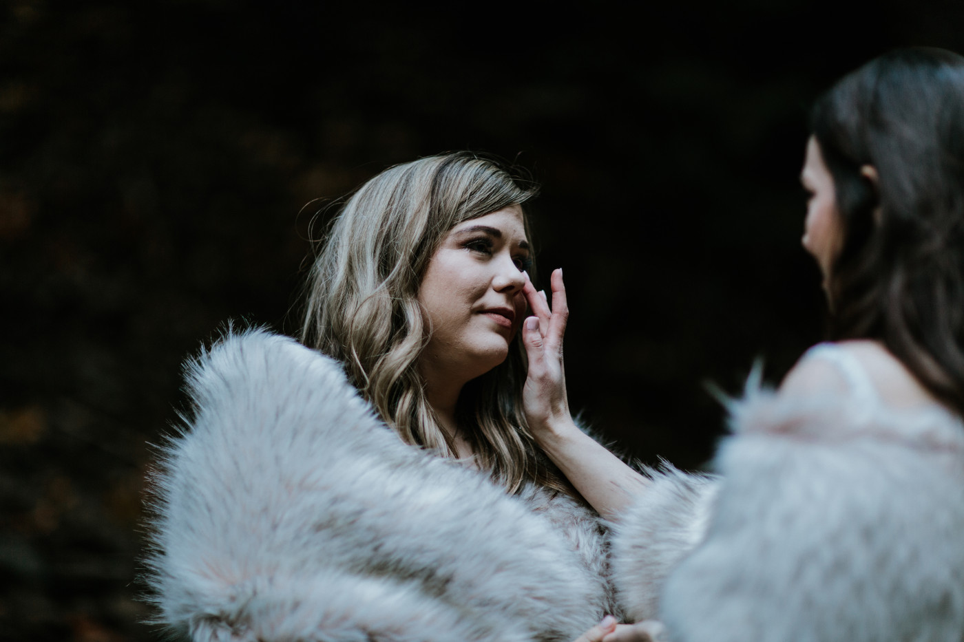 Tiffany and Hayley standing during their elopement ceremony. Elopement photography at the Columbia River Gorge by Sienna Plus Josh.