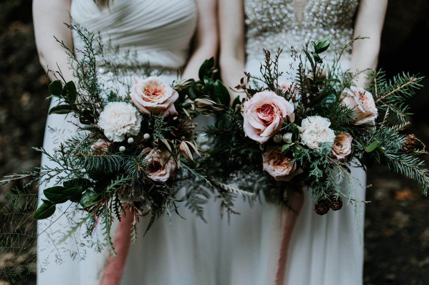 The brides show off their flowers. Elopement photography at the Columbia River Gorge by Sienna Plus Josh.