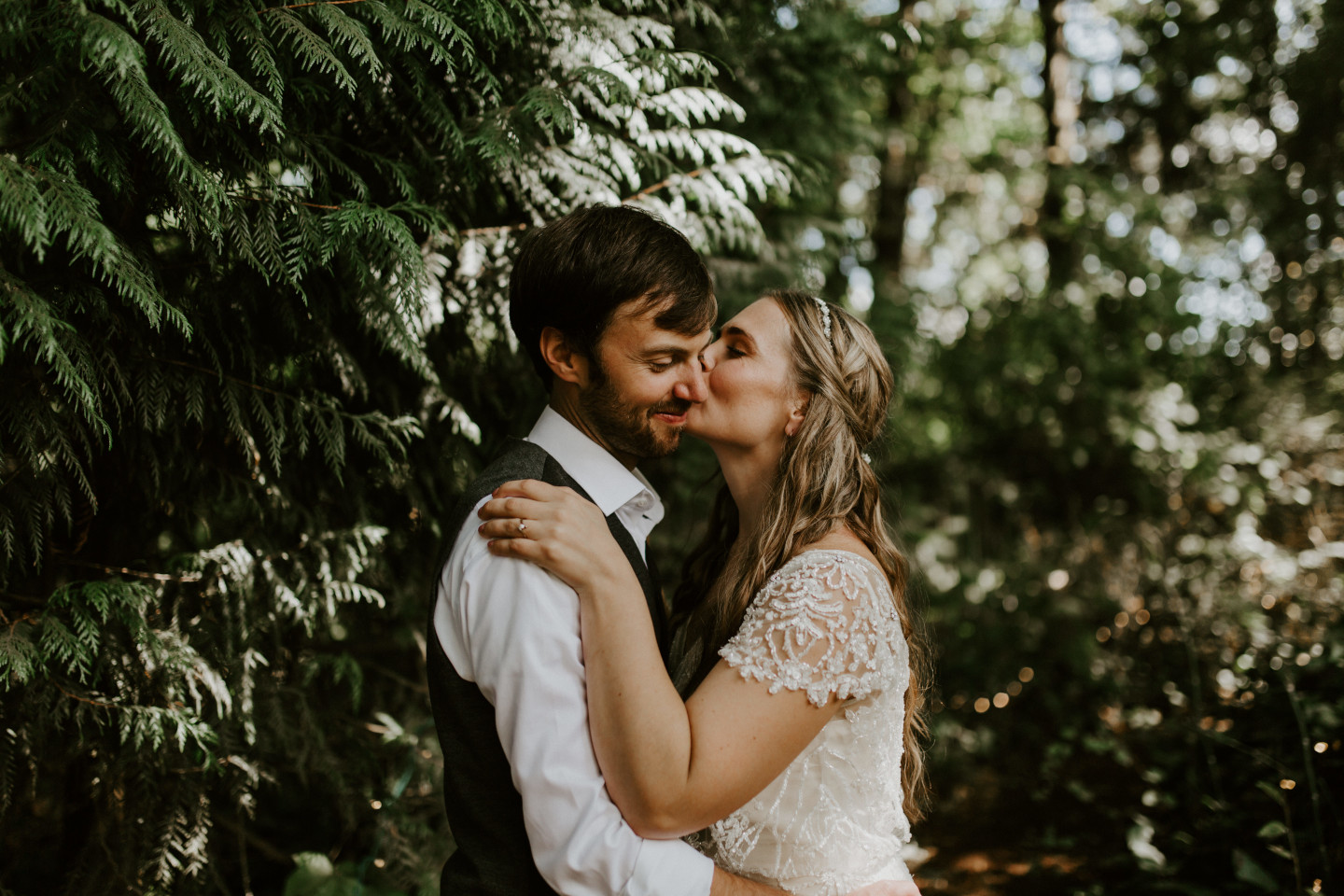 Hannah kisses Dan in Corvallis, Oregon. Intimate wedding photography in Corvallis Oregon by Sienna Plus Josh.