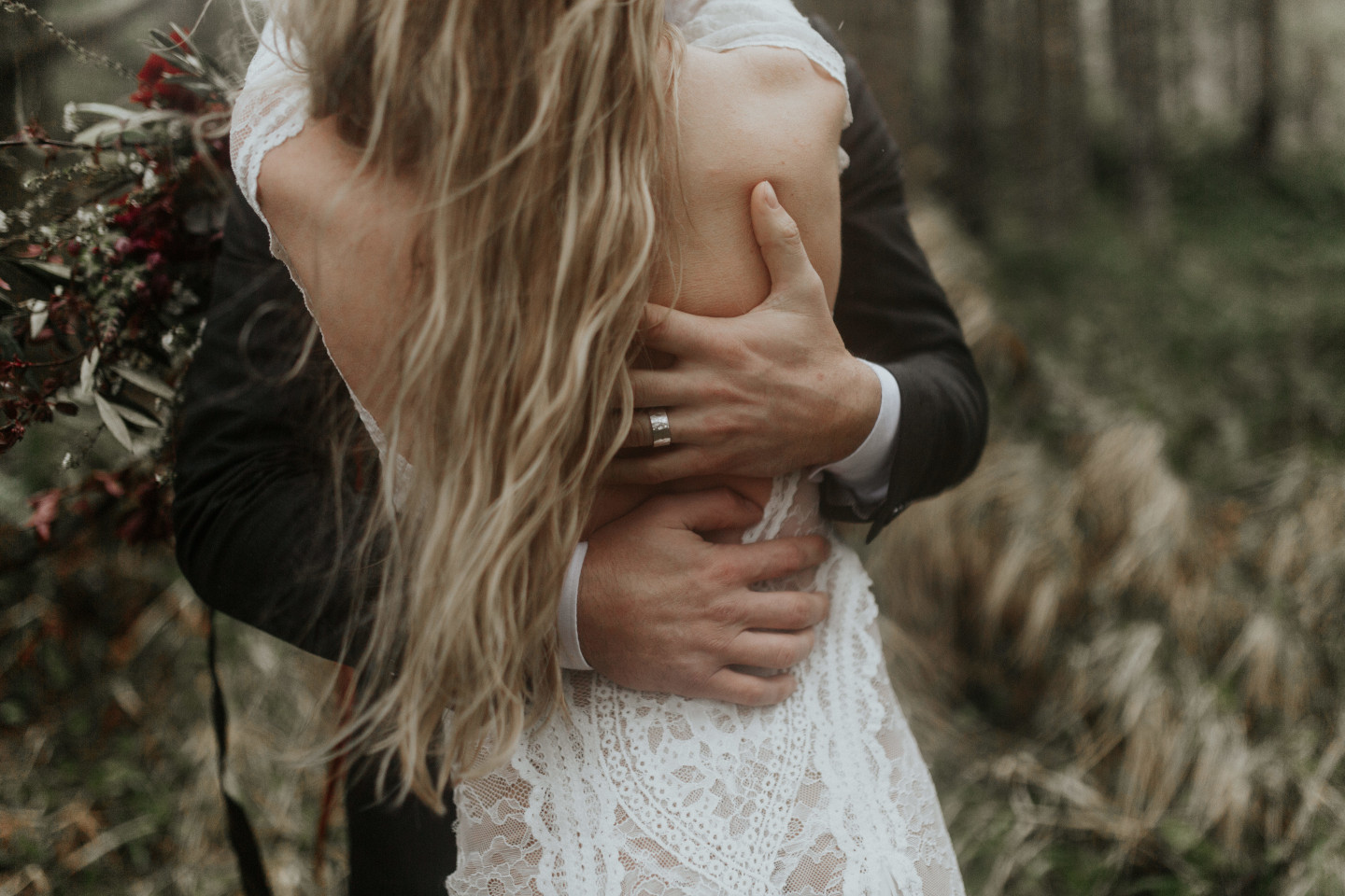 Hannah and Oregon hug at their Cannon Beach elopement in Oregon. Wedding photography in Portland Oregon by Sienna Plus Josh.