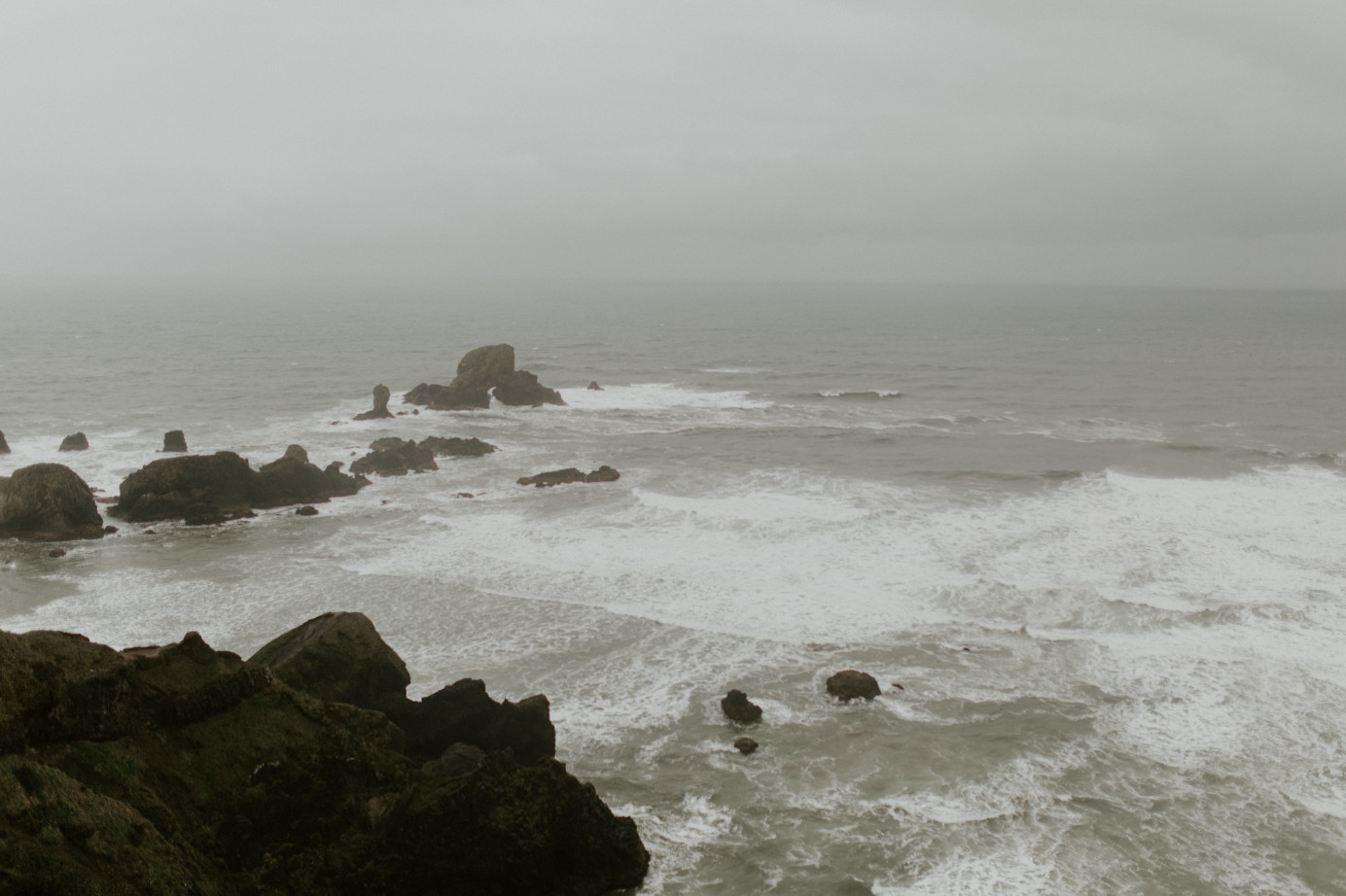 A view of the Cannon Beach shore in Oregon. Wedding photography in Portland Oregon by Sienna Plus Josh.