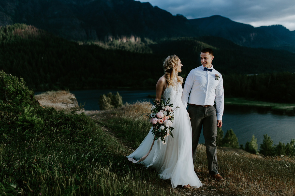 Harper and Trevor walk along the cliffs at Cascade Locks at the Columbia Gorge, Oregon. Elopement photography in Portland Oregon by Sienna Plus Josh.