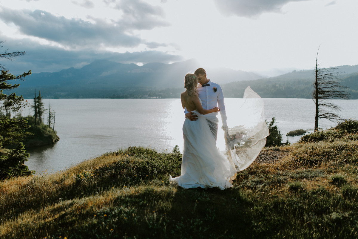 Harper and Trevor stand near the river at Cascade Locks at the Columbia Gorge, Oregon. Elopement photography in Portland Oregon by Sienna Plus Josh.