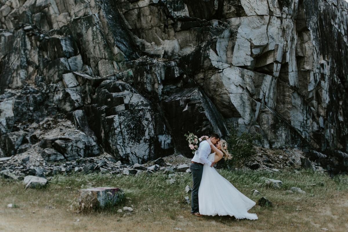 Harper and Trevor embrace at Cascade Locks, Oregon. Elopement photography in Portland Oregon by Sienna Plus Josh.