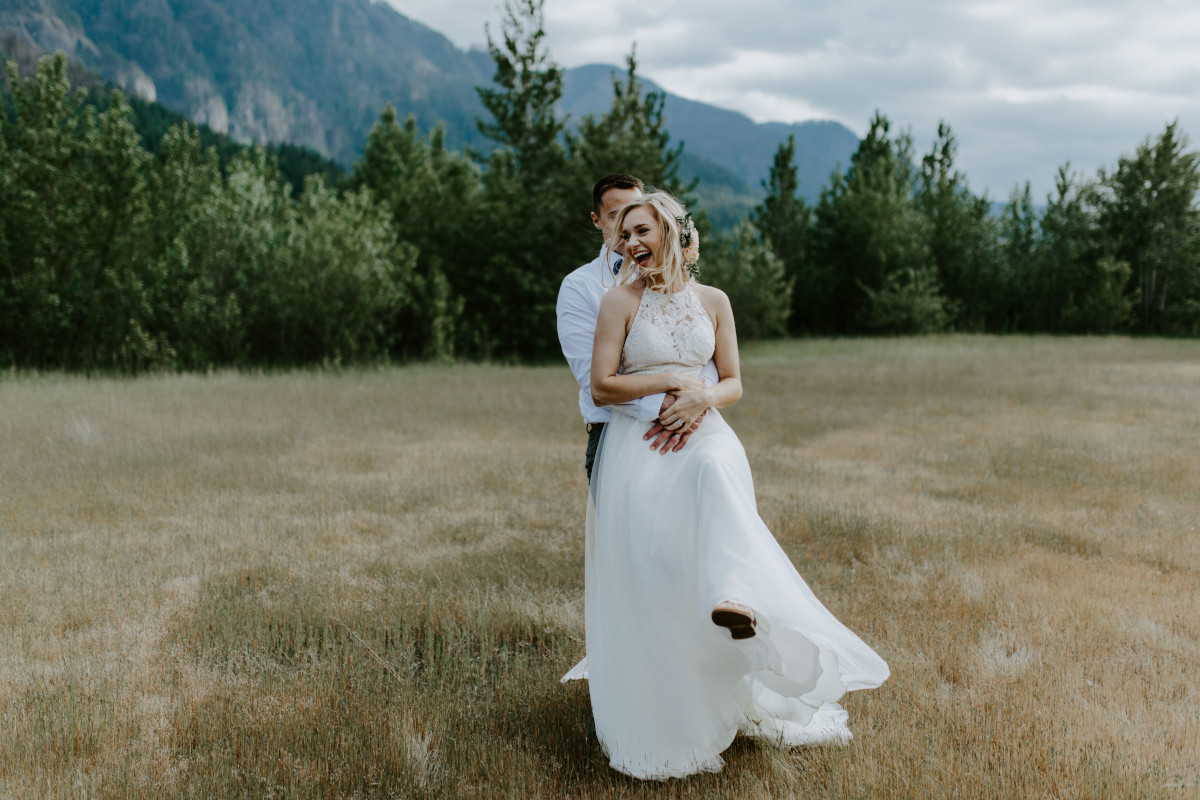 Trevor hugs Harper at Cascade Locks, Oregon. Elopement photography in Portland Oregon by Sienna Plus Josh.