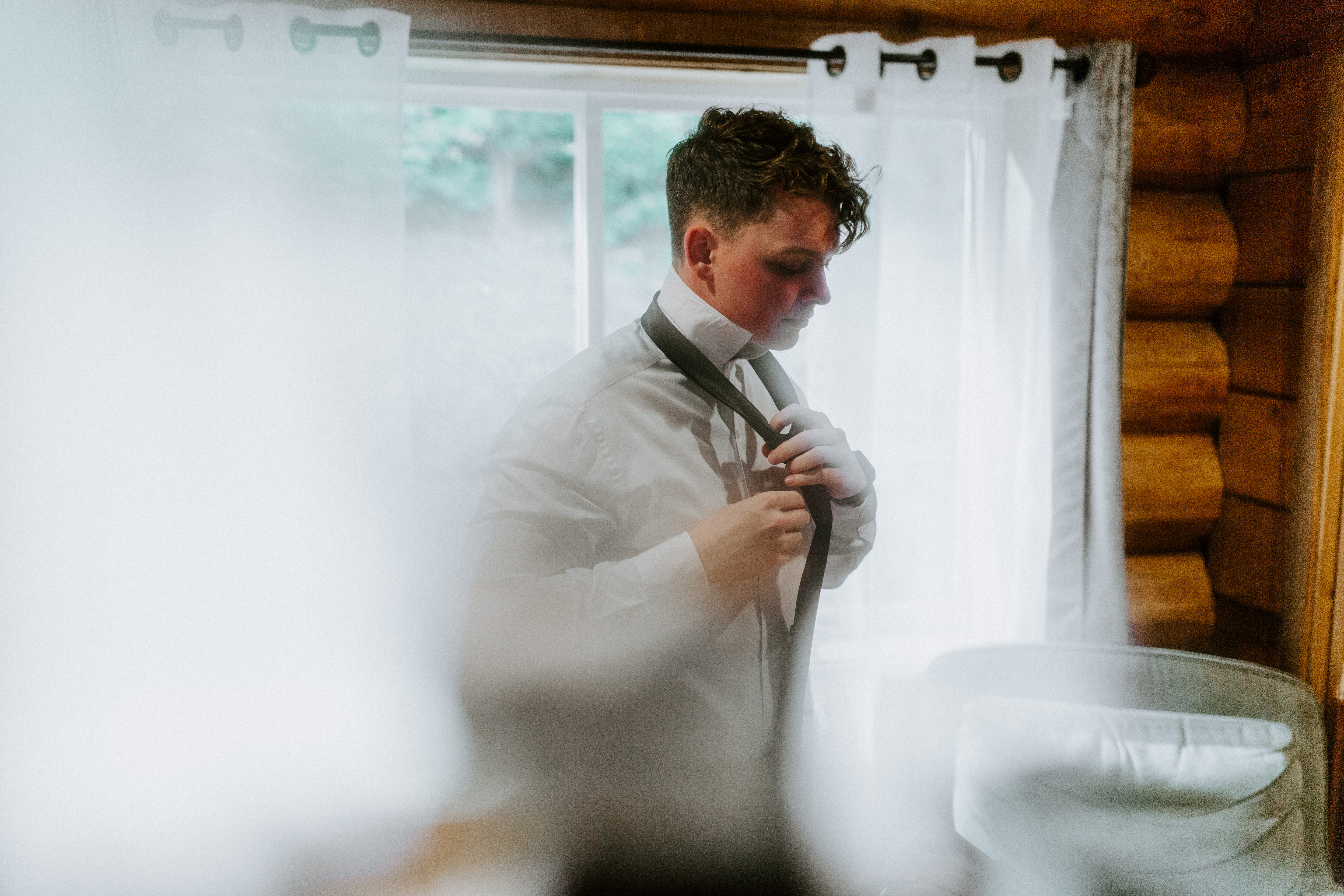 Brett gets ready for his elopement in the Hoh Rainforest, Washington.