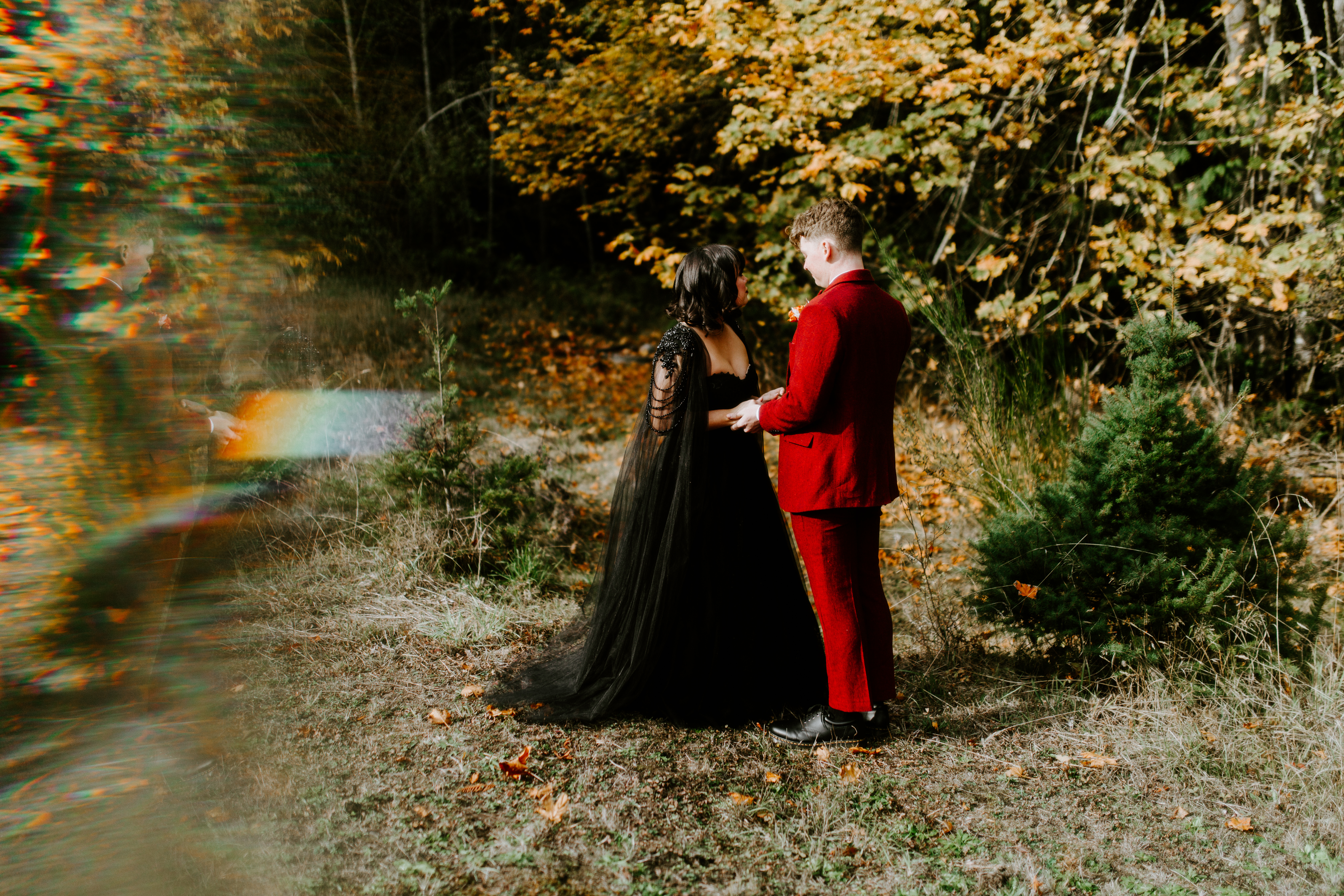 Bethany and Brett stand together before their elopement in the Hoh Rainforest.