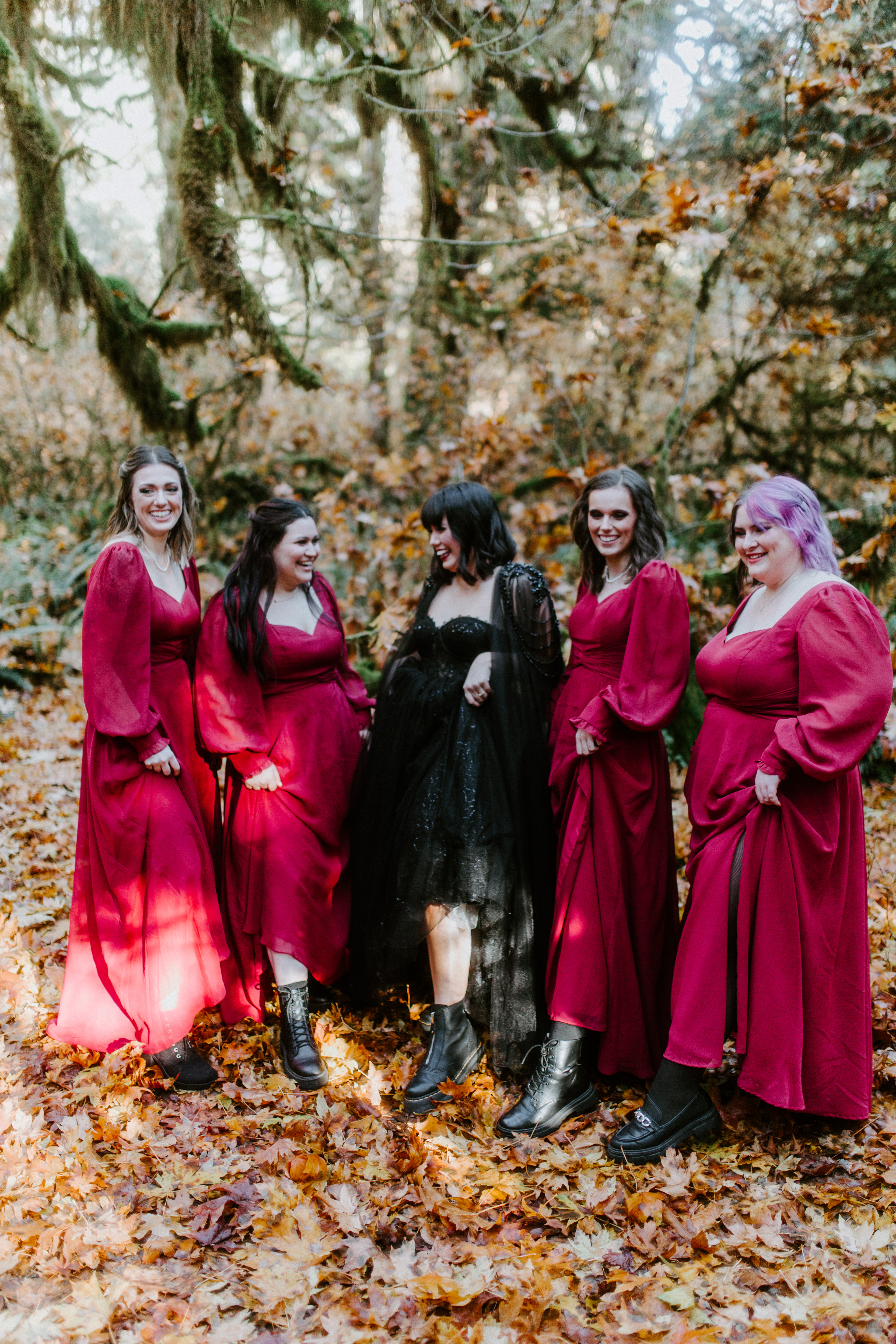 Bethany and her bridesmaids show off their boots after the elopement in the Hoh Rainforest.