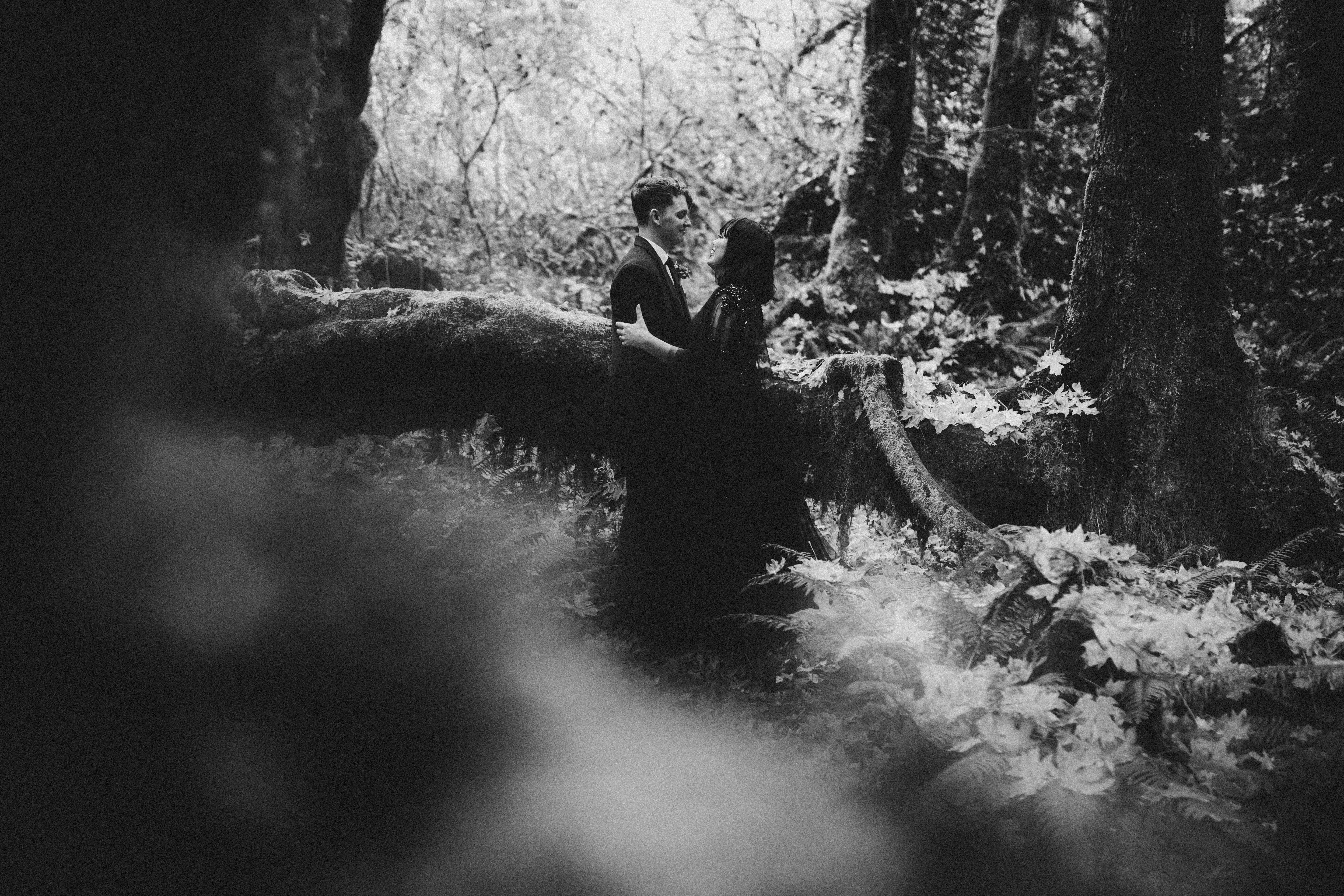 Brett and Bethany stand together after their elopement in the Hoh Rainforest.