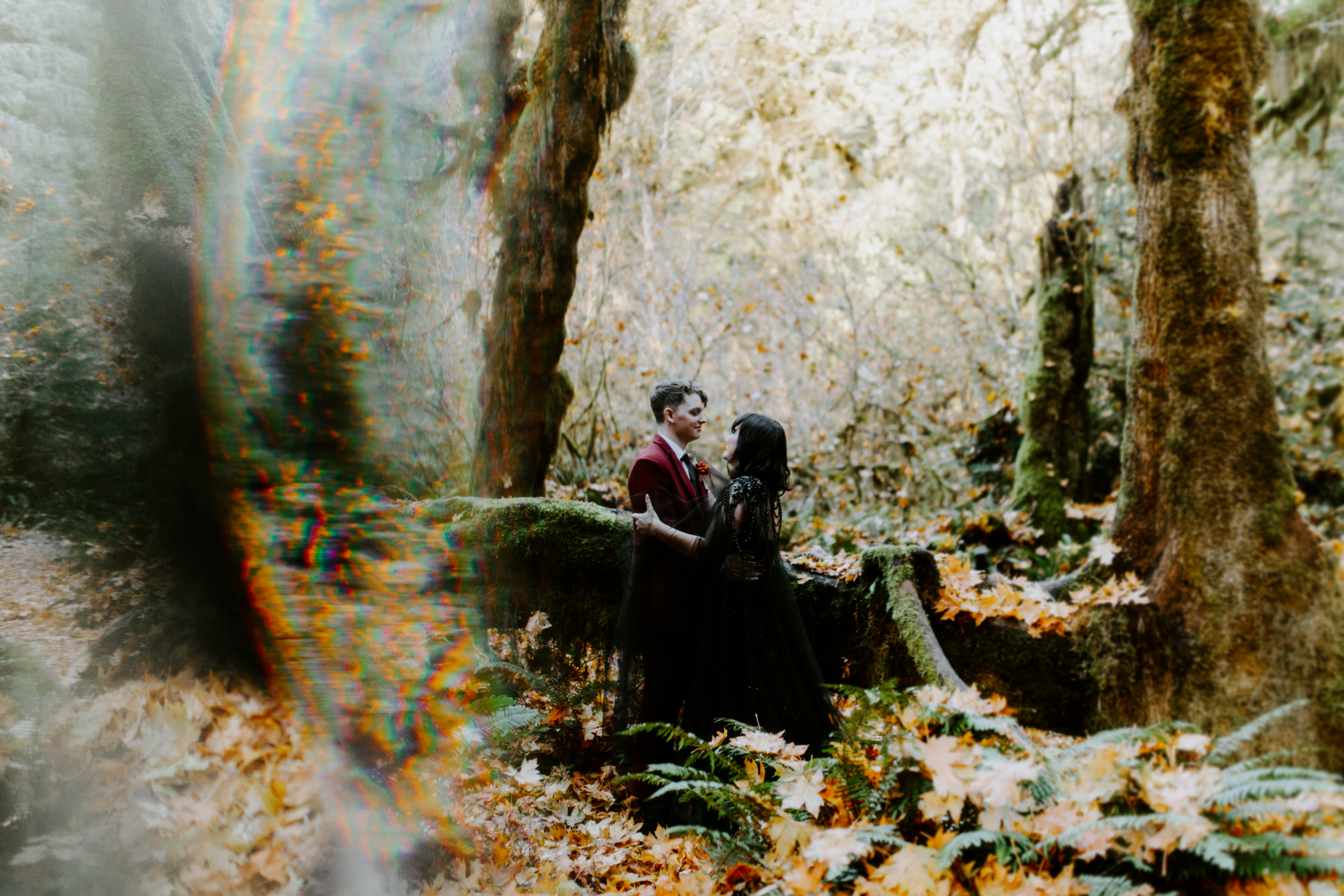 Brett and Bethany admire each other in the Hoh Rainforest after their elopement.