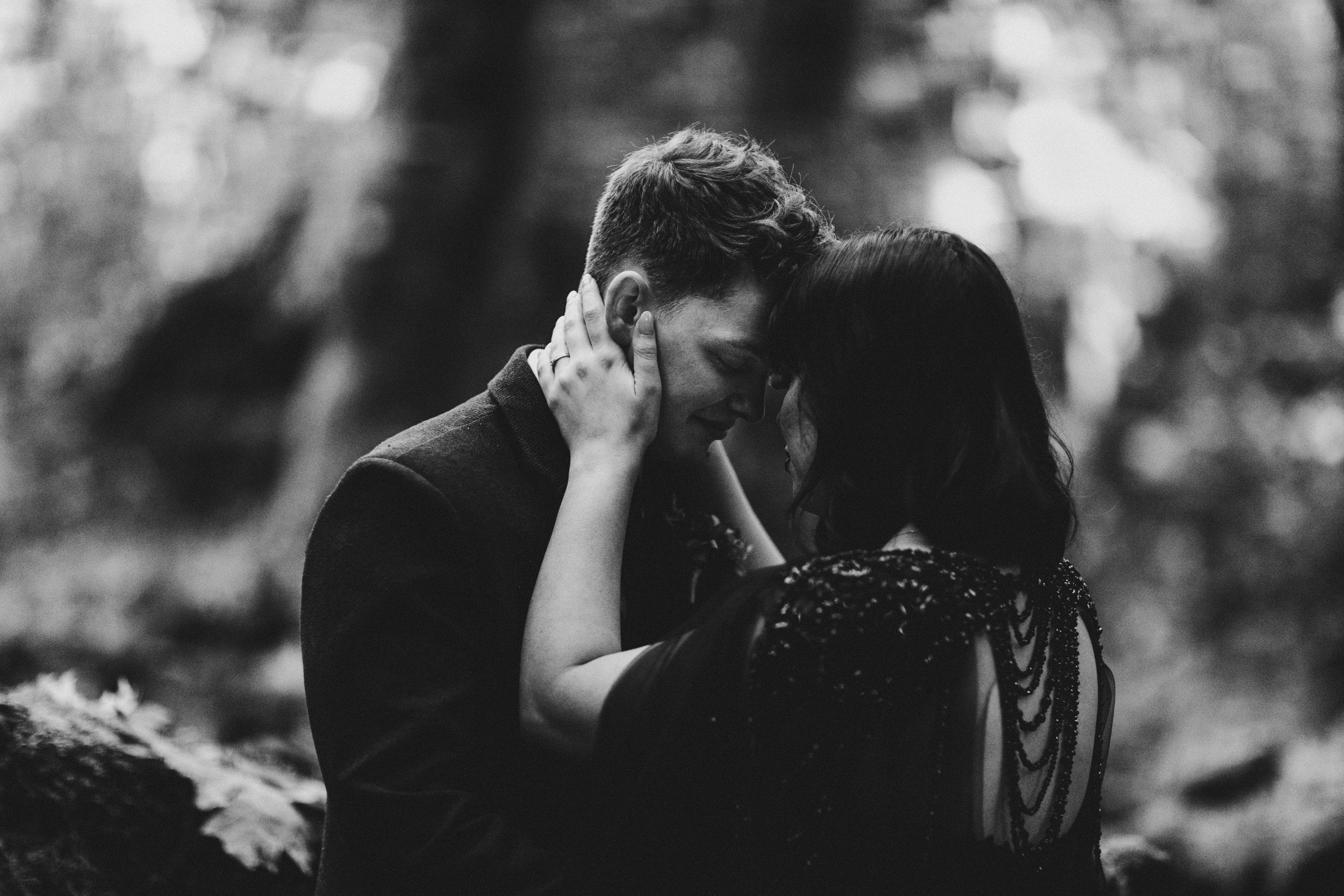 Bethany and Brett share a moment under the treess of Hoh Rainforest.