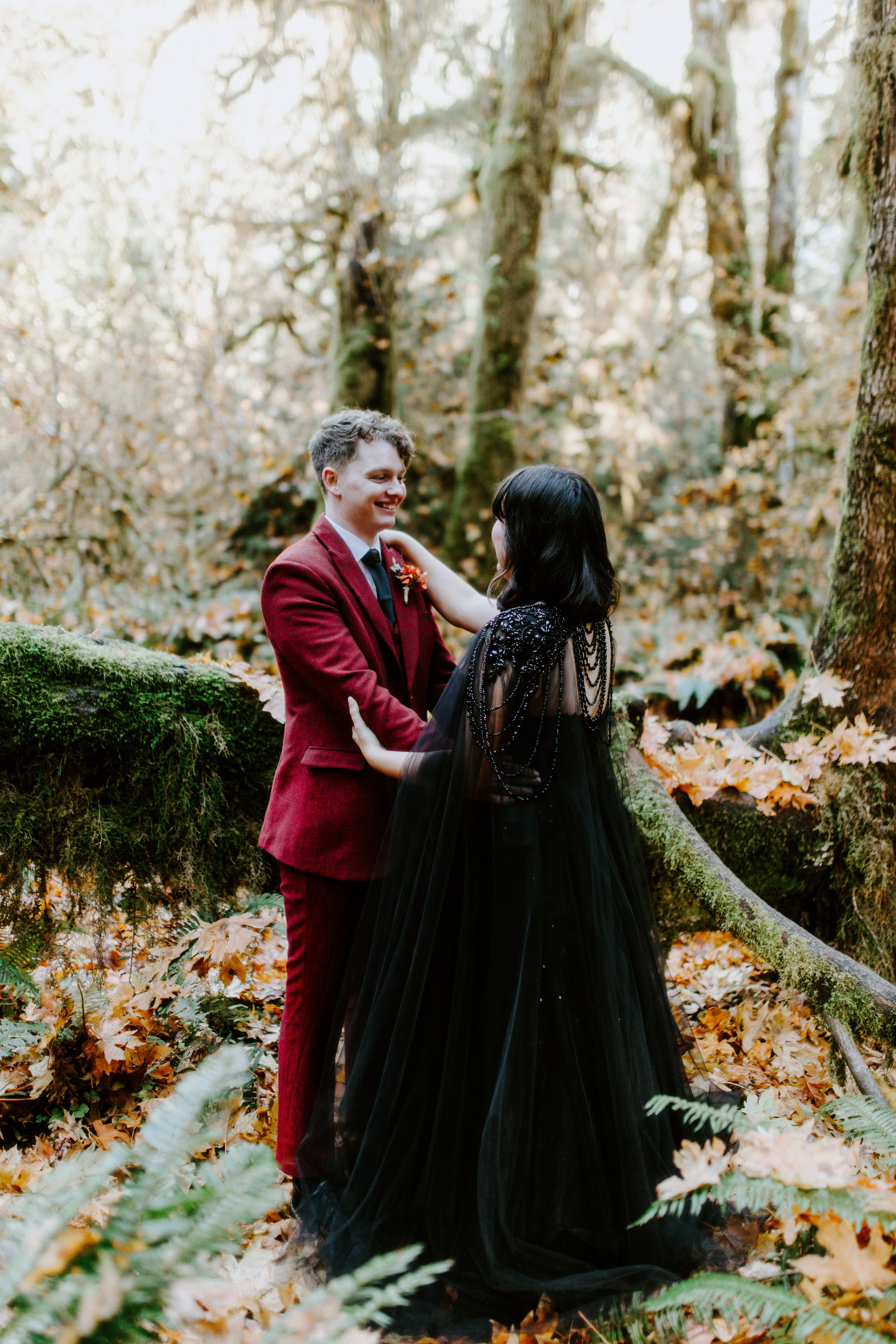 Brett and Bethany admire each other on a path in the Hoh Rainforest.