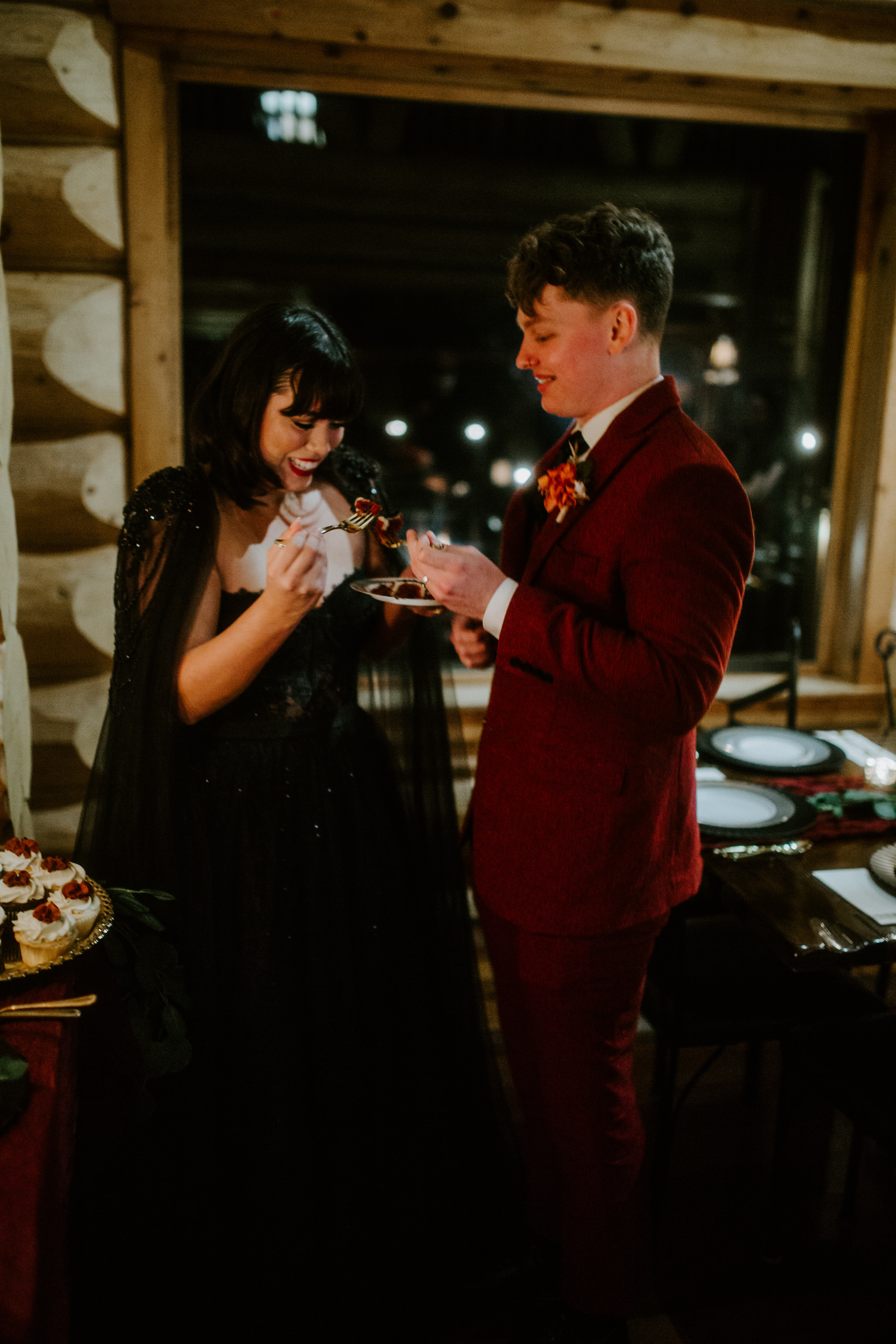Brett and Bethany share a piece of cake after their elopement in the Hoh Rainforest, Washington.