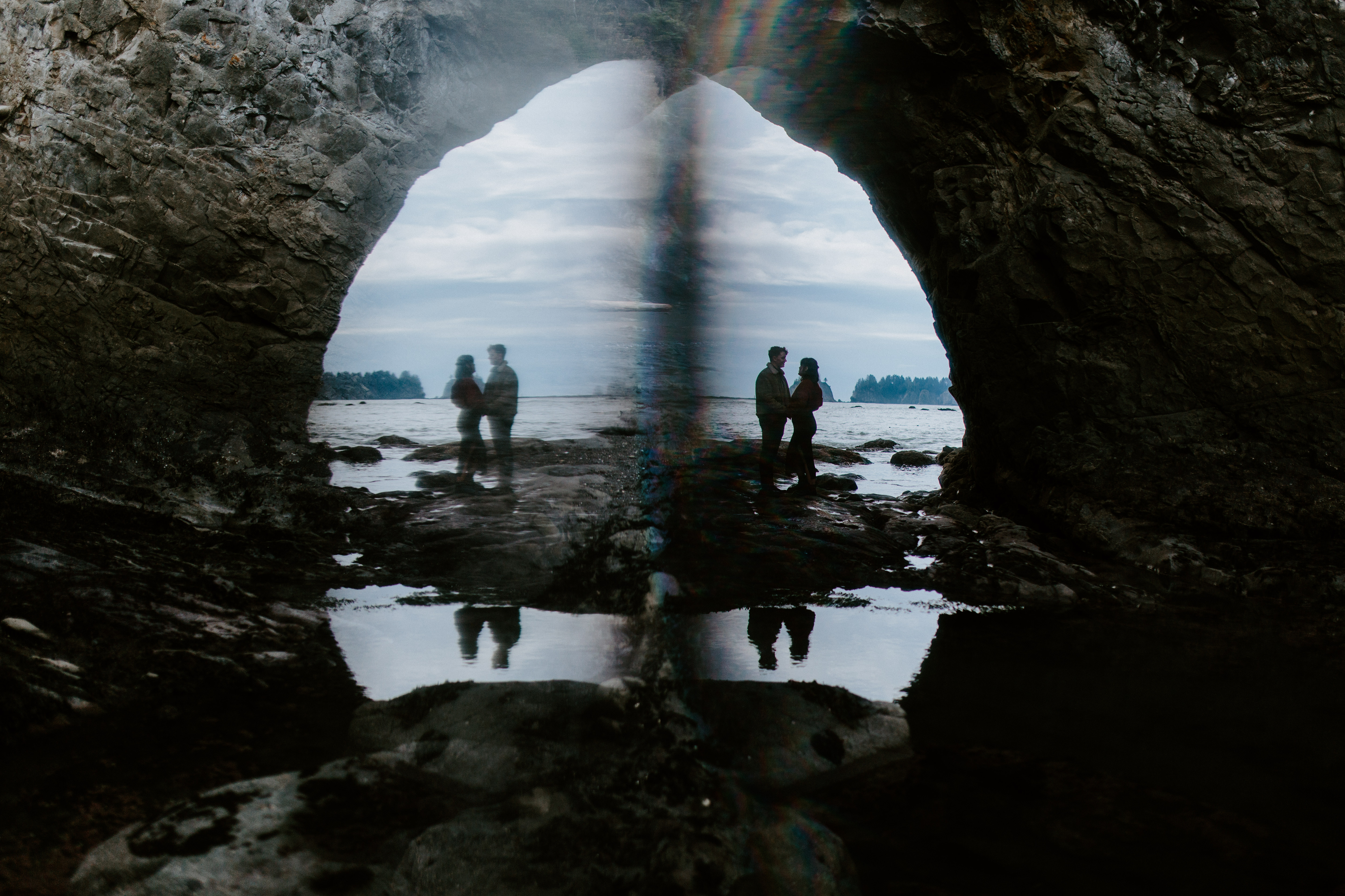 Bethany and Brett hold hands on Rialto Beach.