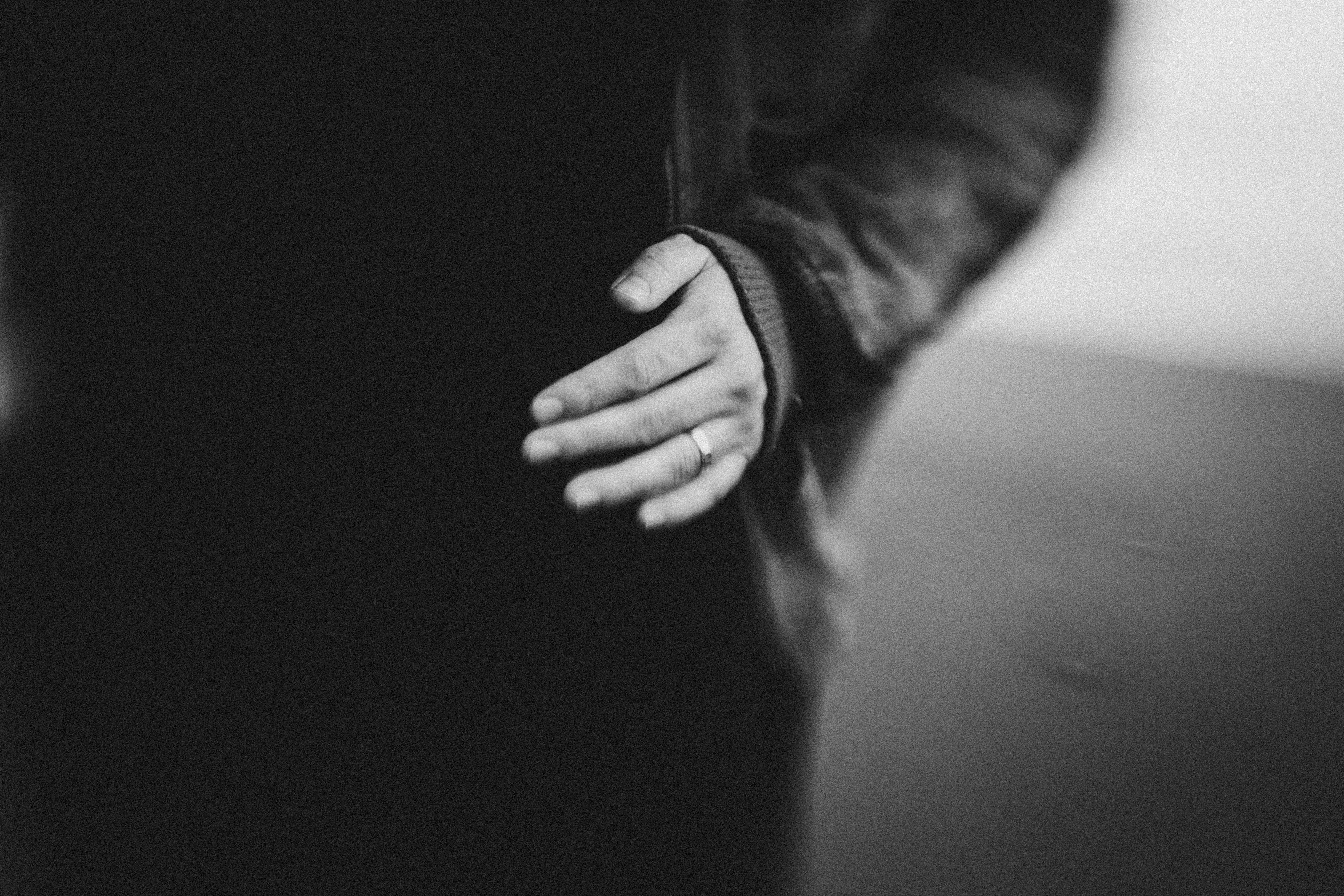 A closeup of Brett's wedding ring at Rialto Beach.