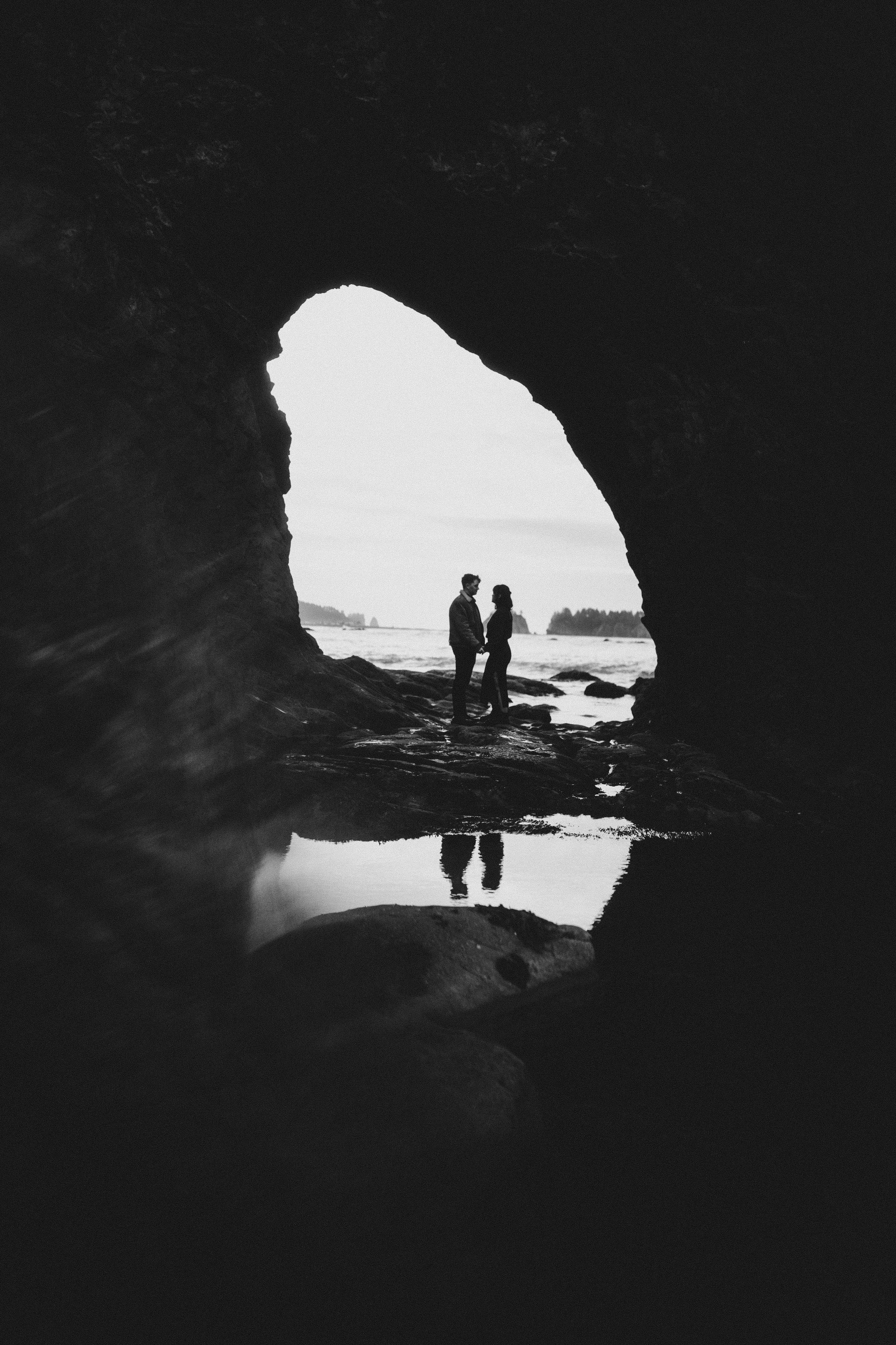 Brett and Bethany hold hands on Rialto Beach.