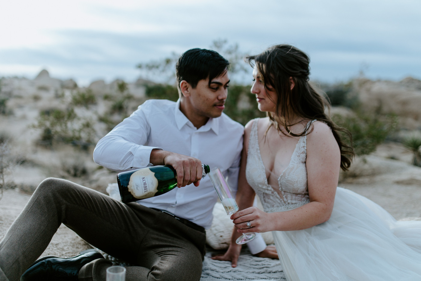 Zack pours some champagne for Shelby.