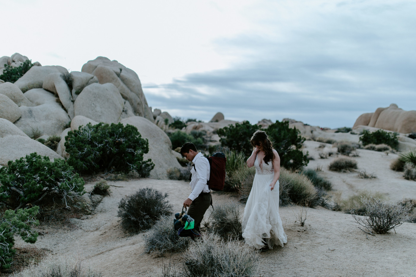 Zack and Shelby walk through the park.