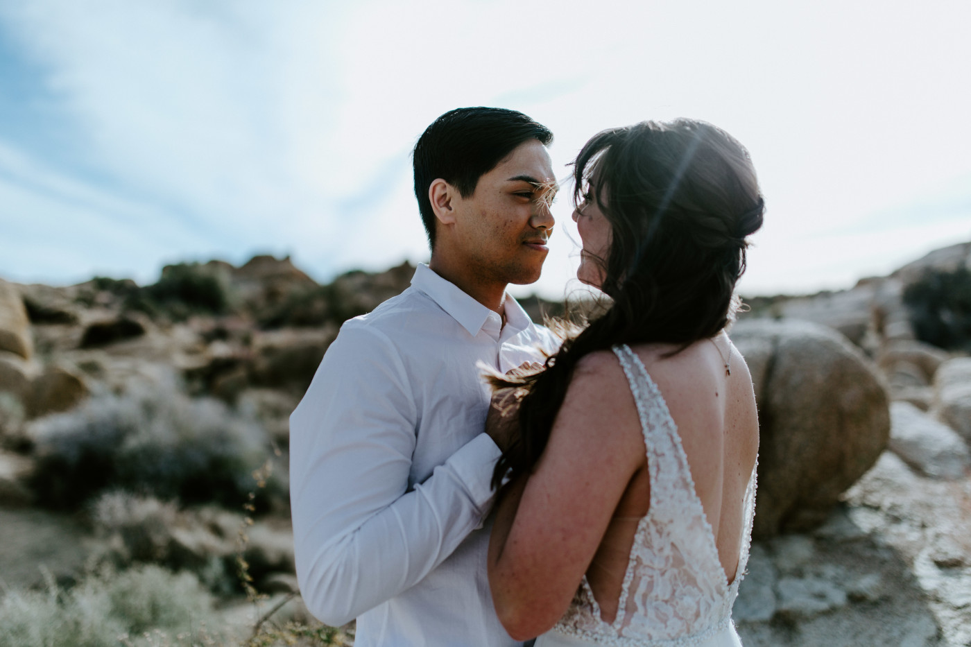 Shelby and Zack stand closely together during their elopement.